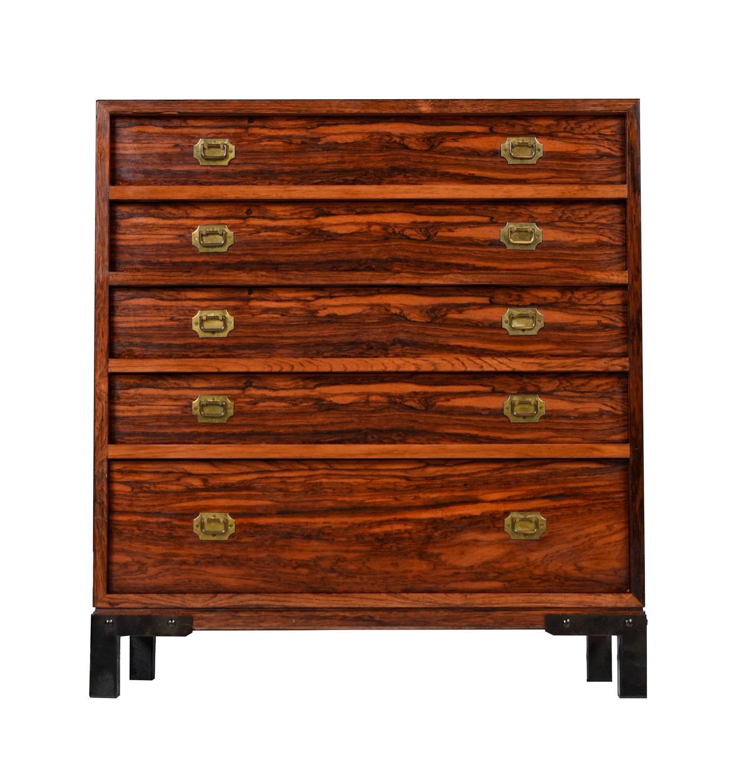 This unique, petite Asian modern chest is made of rosewood and accented with brass handles. The combination of the rich wood grain and detailed brass ornaments give this small coffer an elegant old world feel. Occidental meets Oriental. Perfect