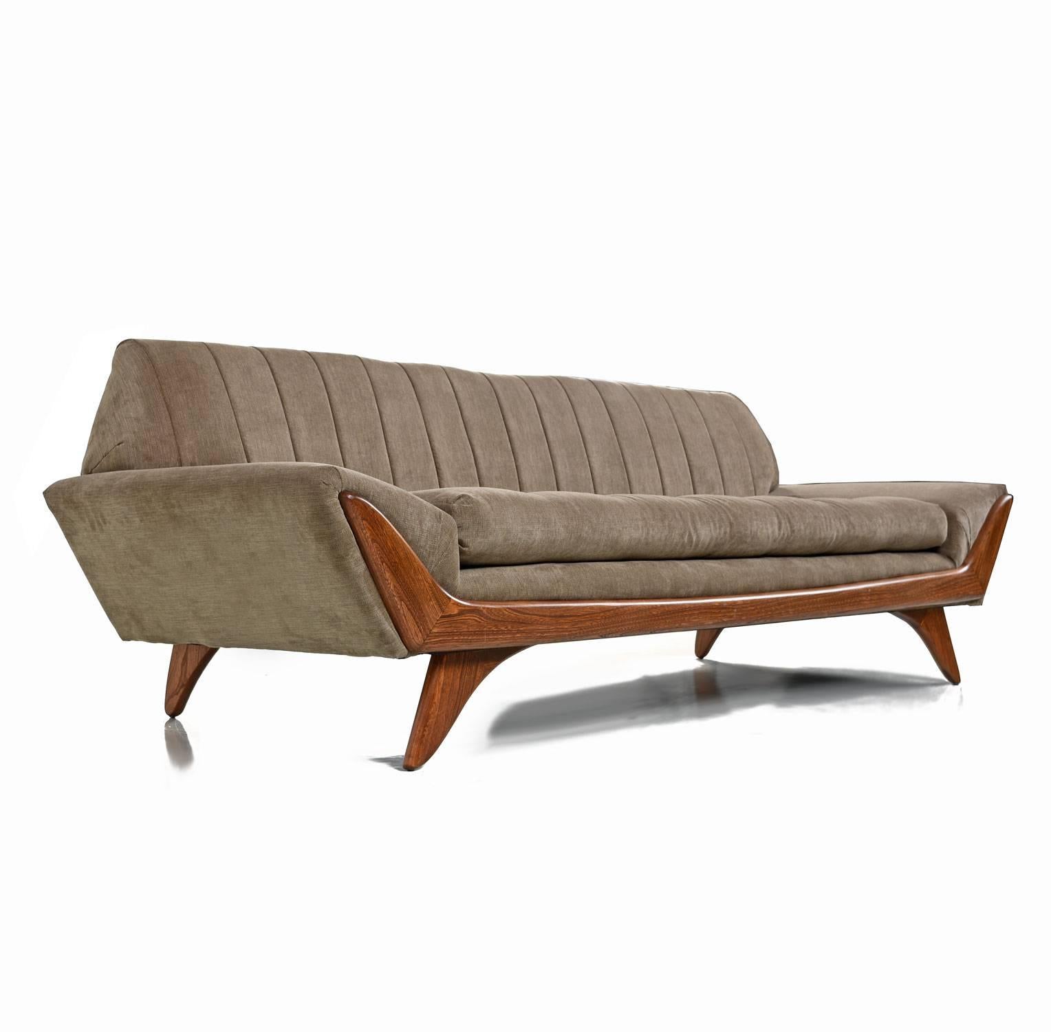 New fabric beautifully outfits this long Mid-Century Modern Adrian Pearsall sofa. Fantastic geometric profile. One of America's most celebrated designers of the period. Adrian Pearsall's ground breaking designs never cease to dazzle, even after a