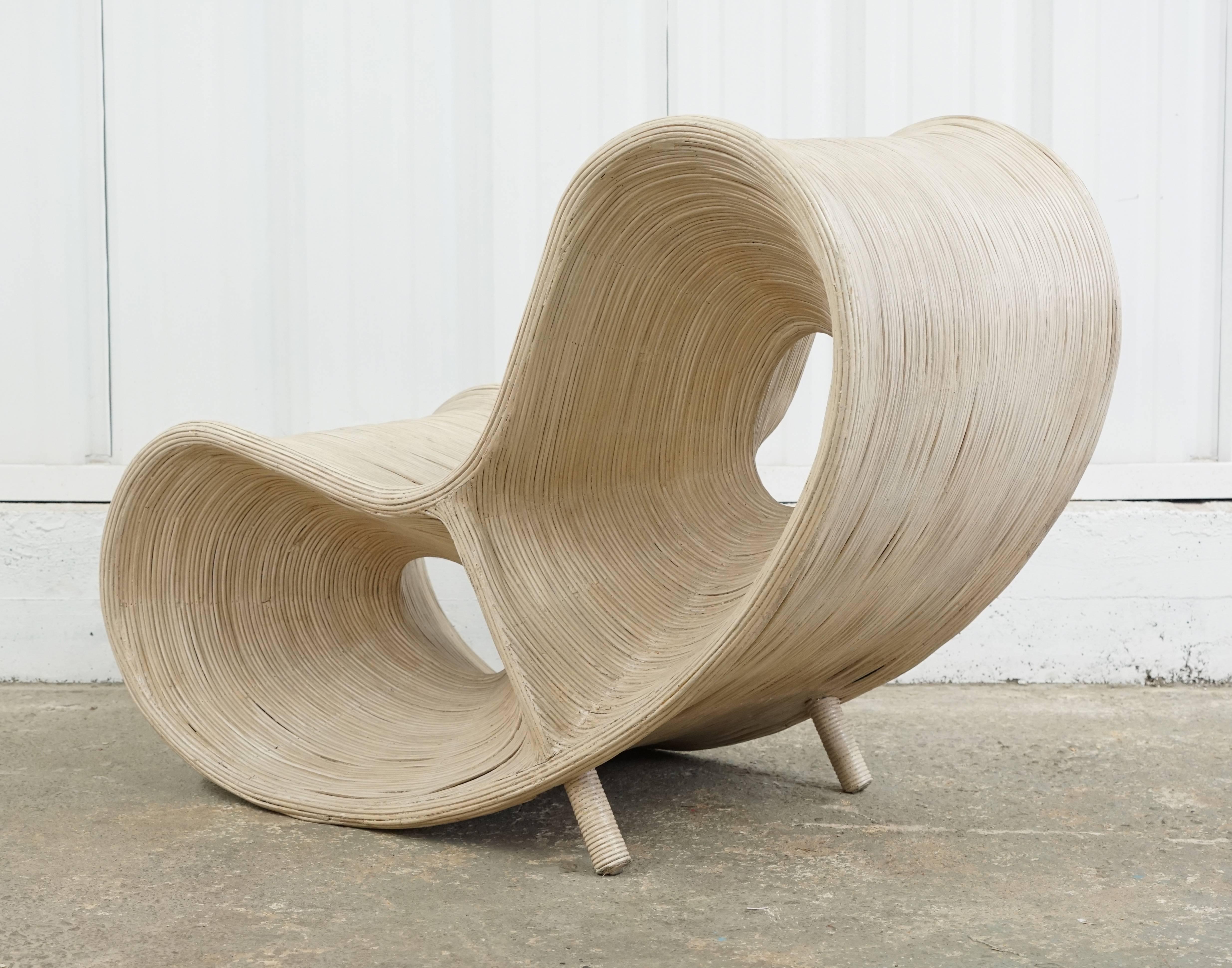 Painted white rattan lounge chair attributed to Ron Arad. Art and sculpture meet design. Finished 360 degrees. Special piece!