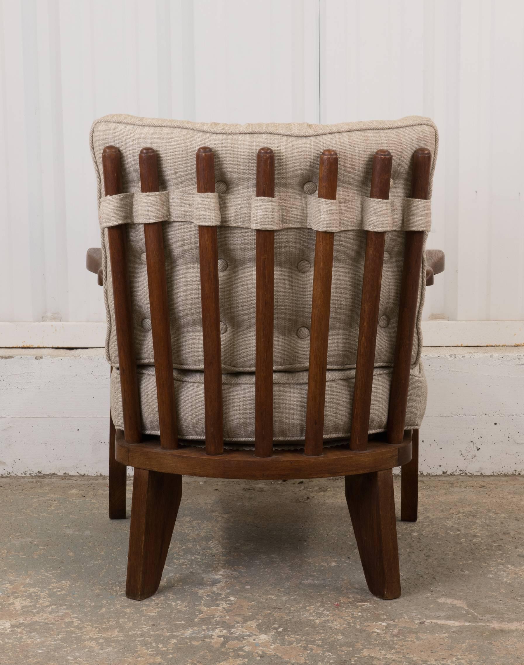 French Guillerme et Chambron Petite Oak Armchair with Hidden Cup Holder