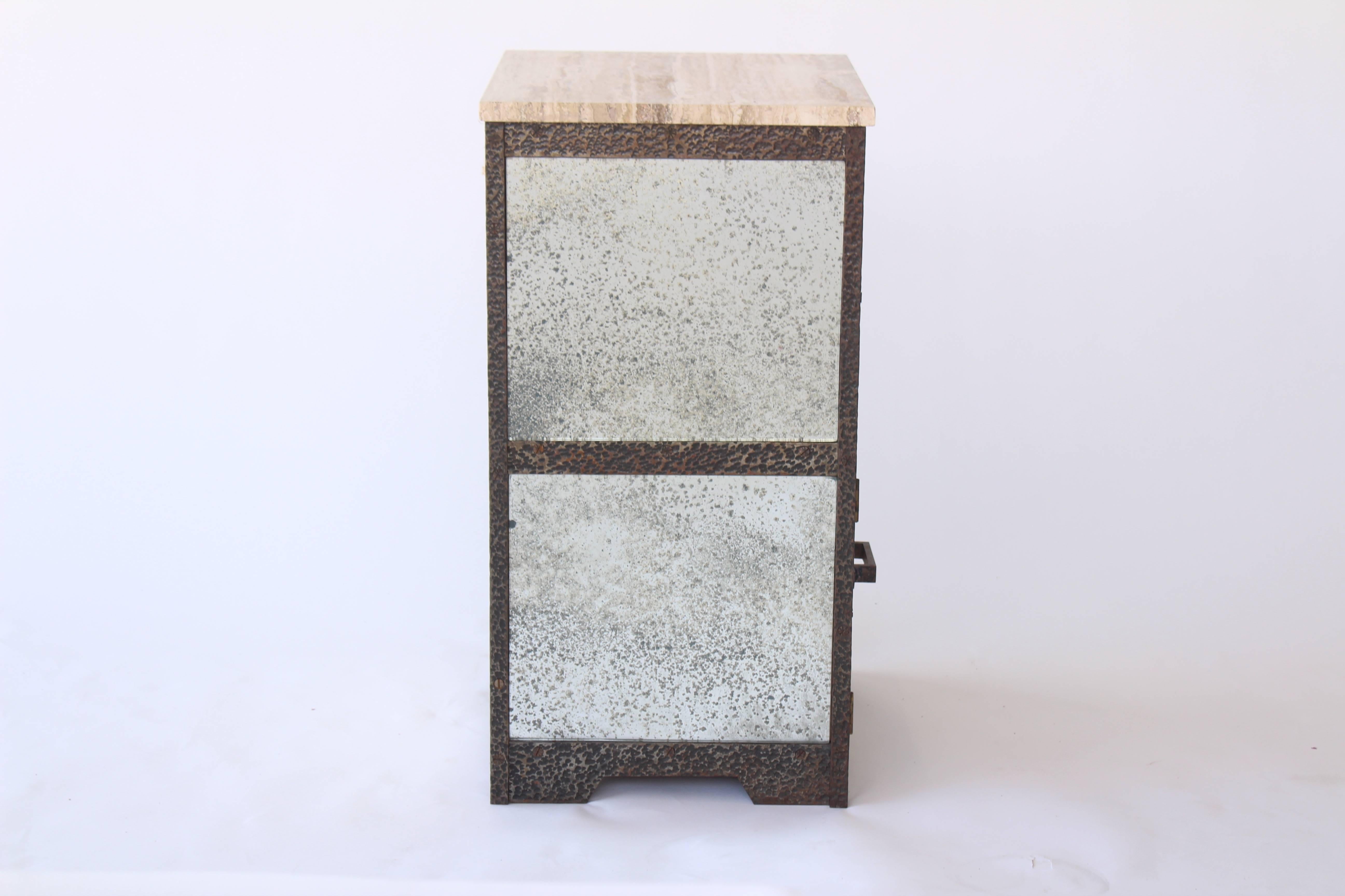French 1930s hammered wrought iron end tables with antiqued mirror drawers and sides and travertine top.