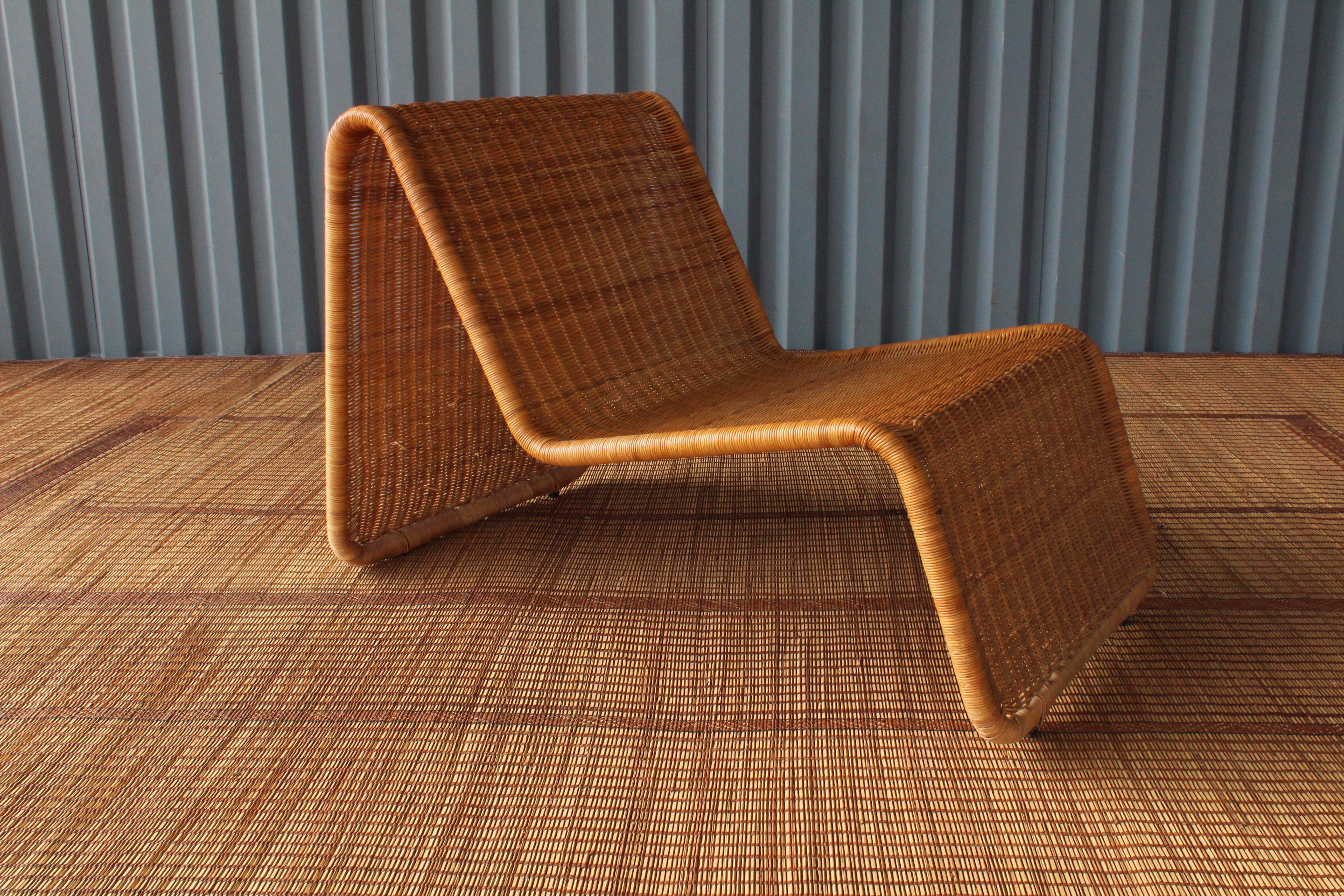 Amazing pair of Tito Agnoli P3 lounge chairs for Bonacina, Italy, 1960s. Woven wicker on a tubular steel frame. Not only a great design but comfortable as well. Perfect for indoor or outdoor use. Both chairs are in excellent condition.