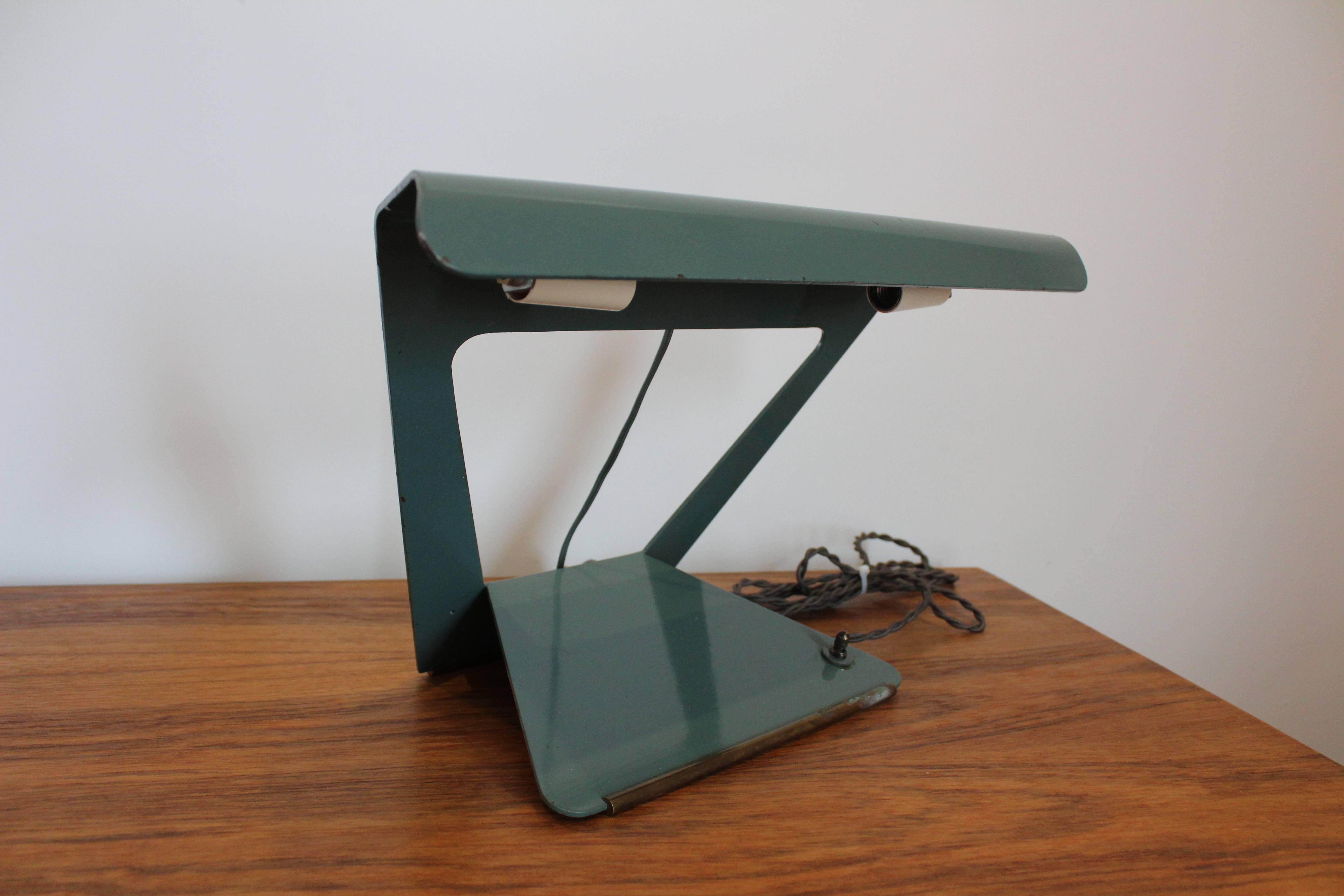 A 1950s Charlotte Perriand desk lamp for Phillips International. Newly rewired.