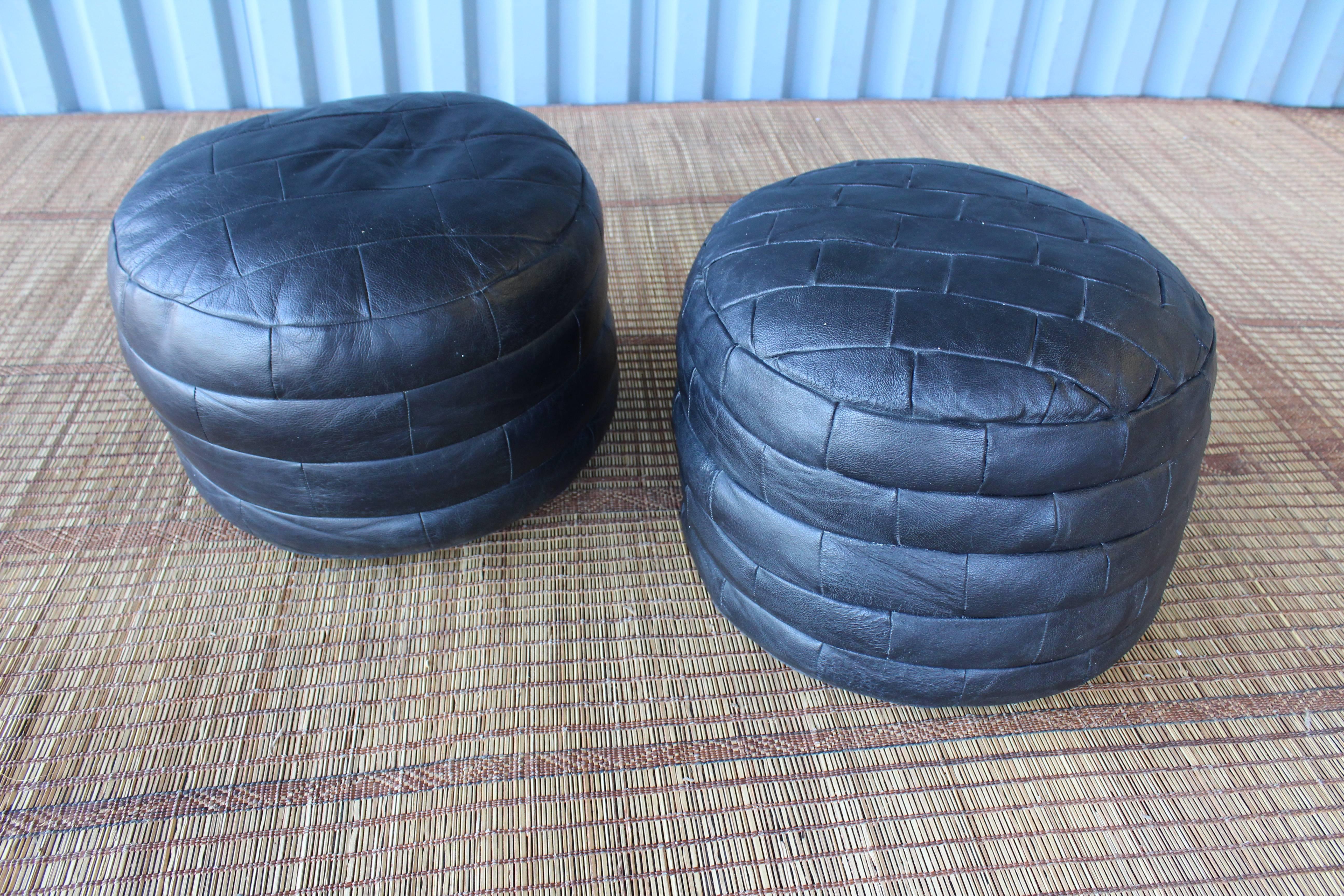 A fun pair of 1970s leather patchwork ottomans by De Sede, Switzerland.