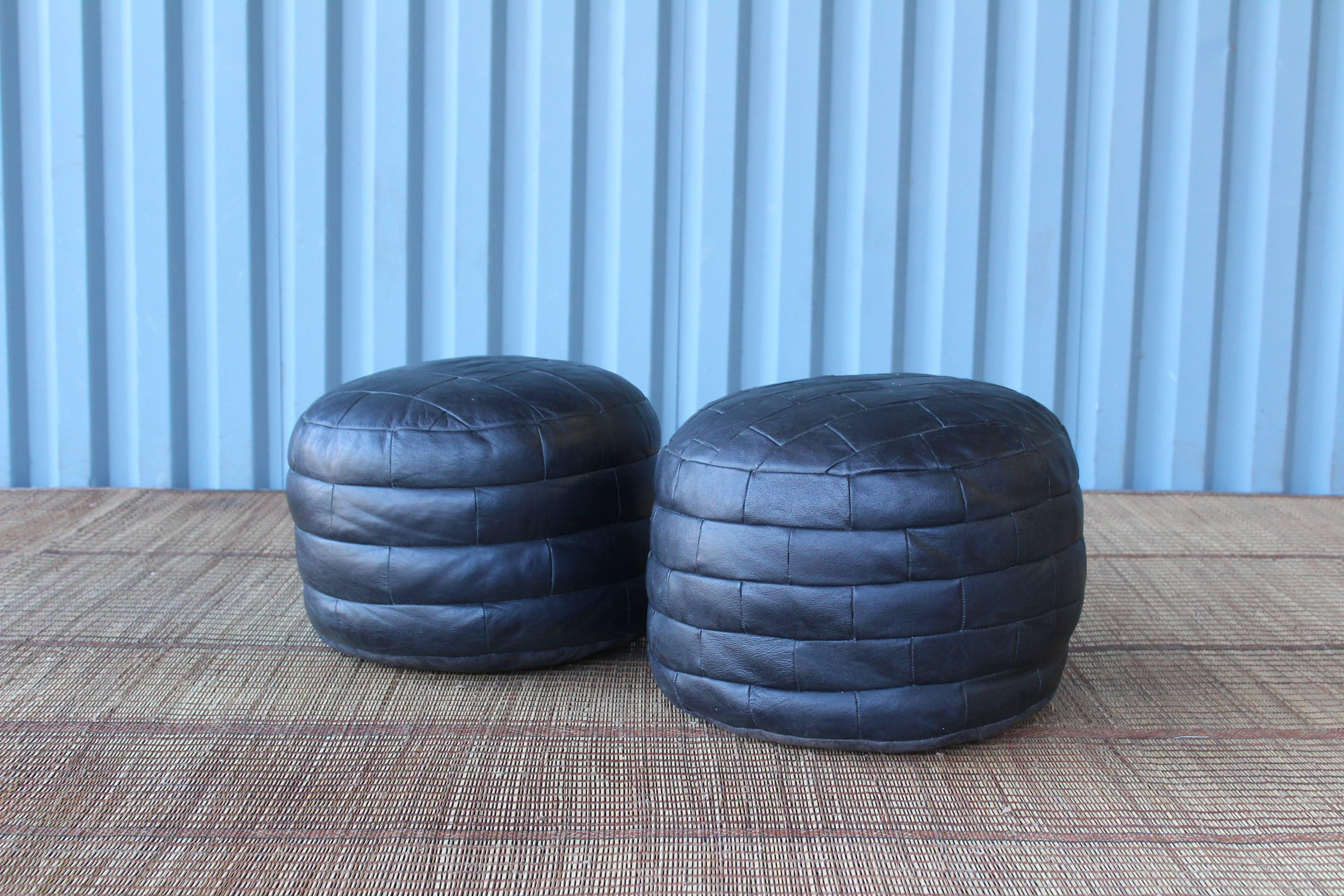 Pair of De Sede Black Leather Patchwork Ottomans In Excellent Condition In Los Angeles, CA
