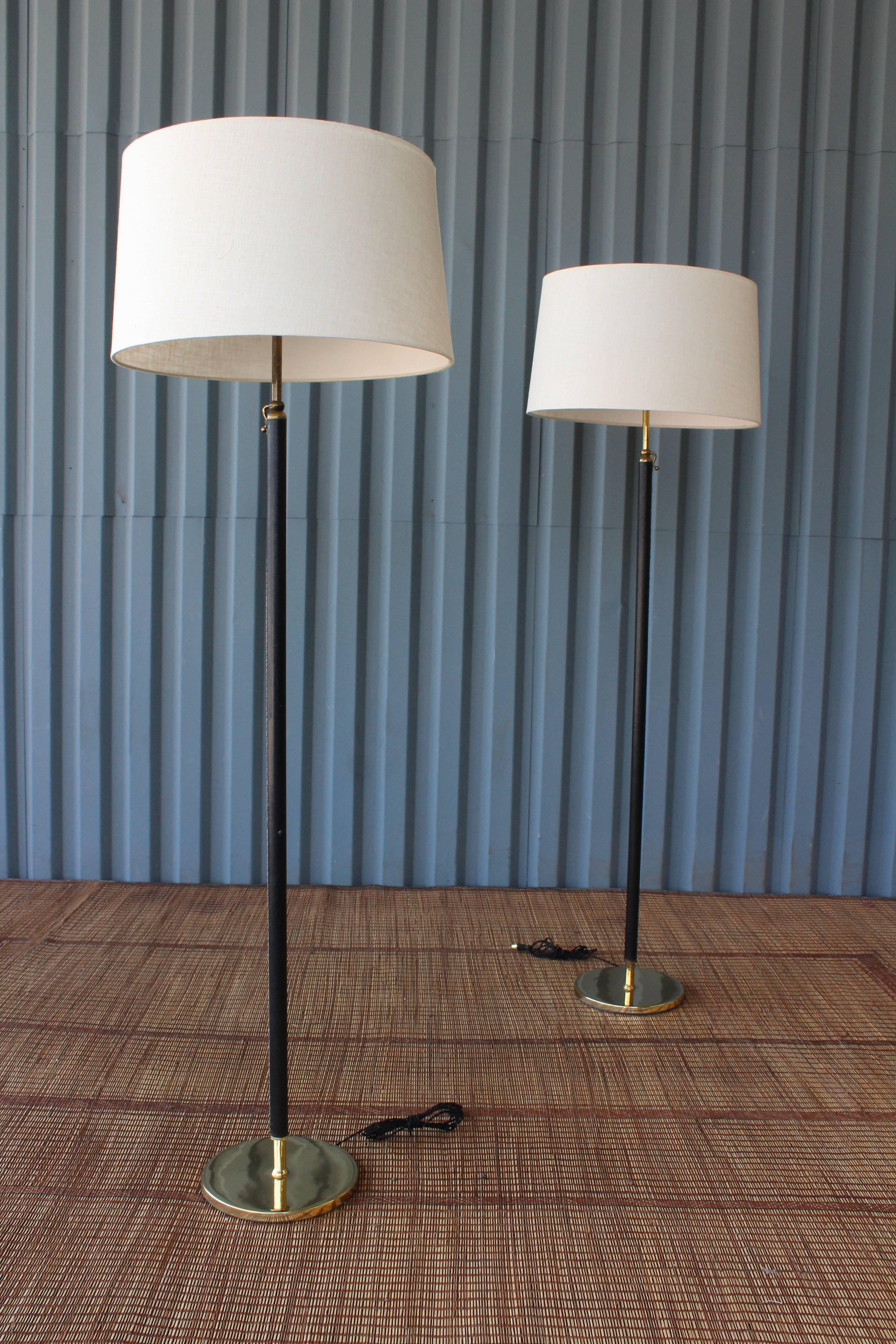 Mid-20th Century Pair of Jacques Adnet Style Brass and Leather Wrapped Floor Lamps
