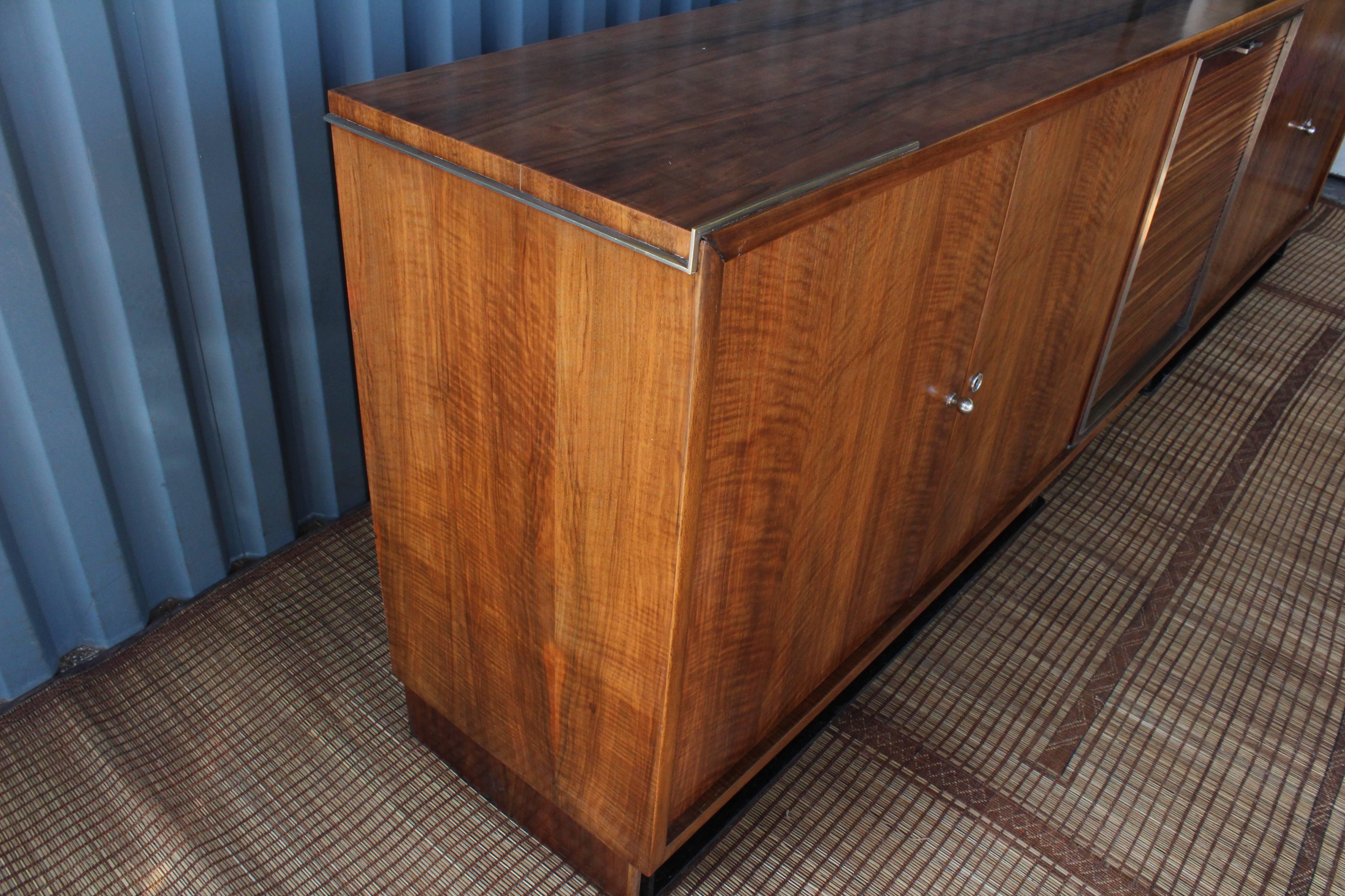 Mid-20th Century Paul Dupré-Lafon Walnut, Iron and Nickel Tambour Front Cabinet