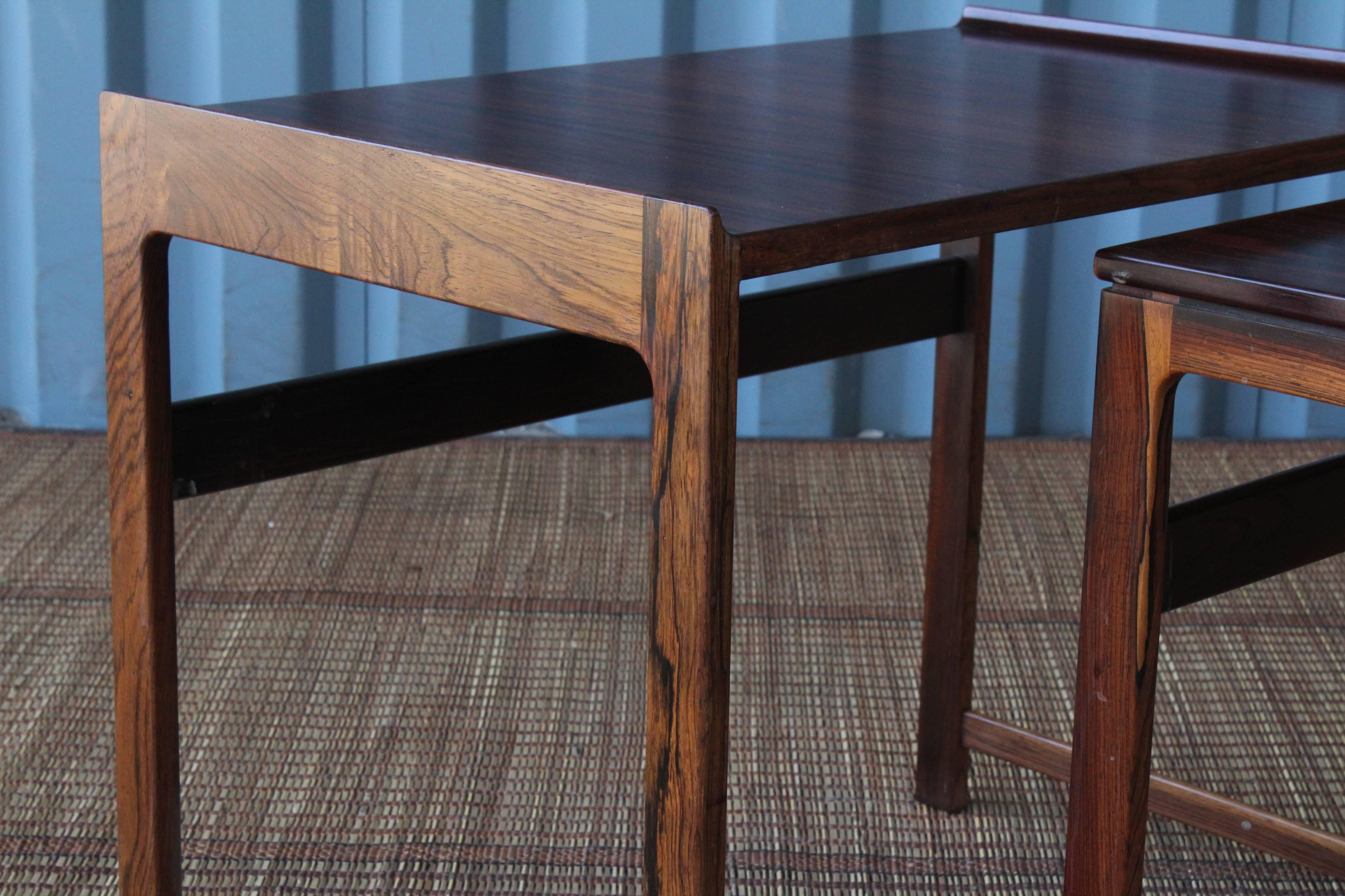 Set of three Danish rosewood nesting tables, circa 1960s. These tables are in wonderful condition and can be used in a handful of ways.