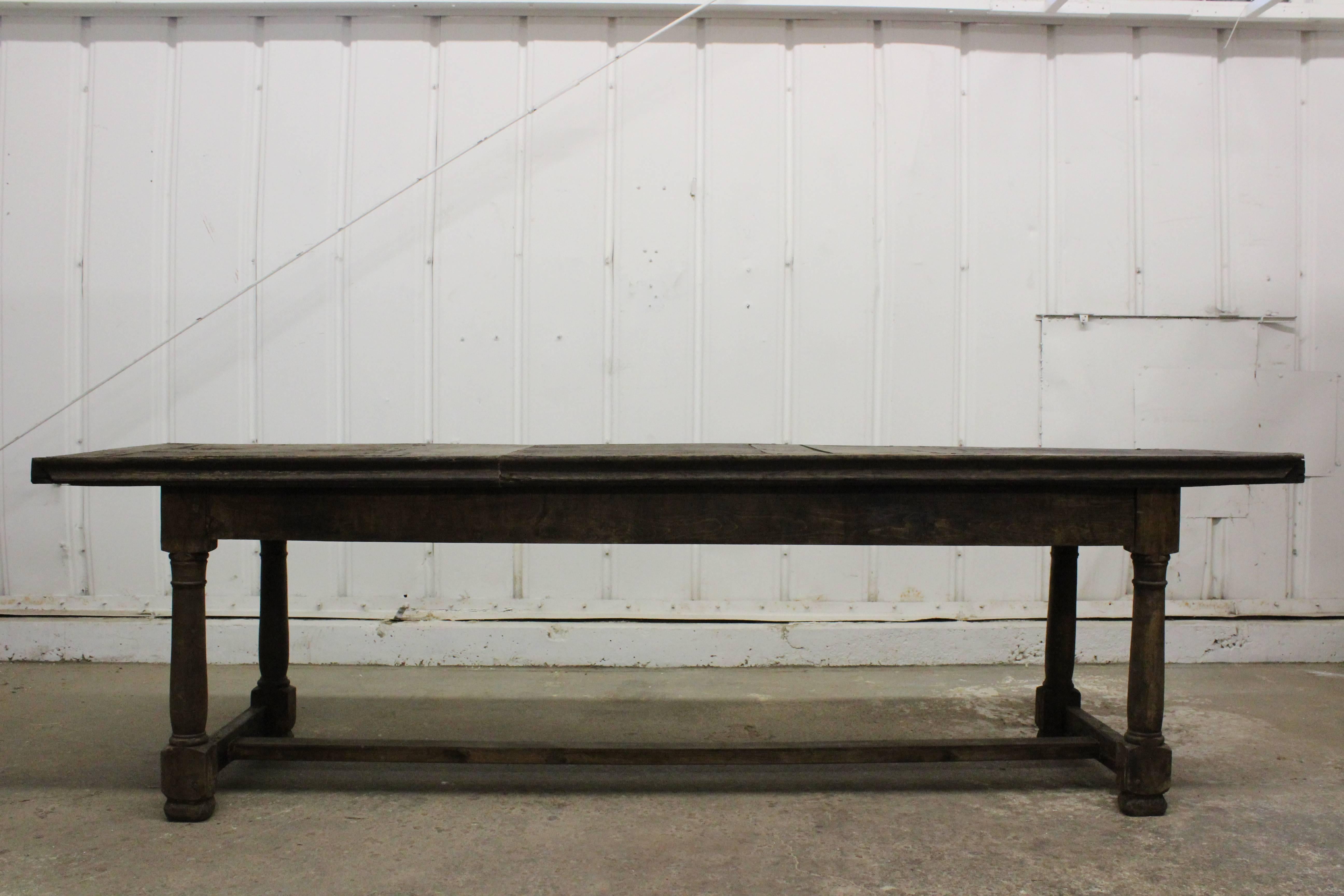 Antique 17th century refectory table made of English oak. This table is in it's original condition with heavy patina and signs of wear.