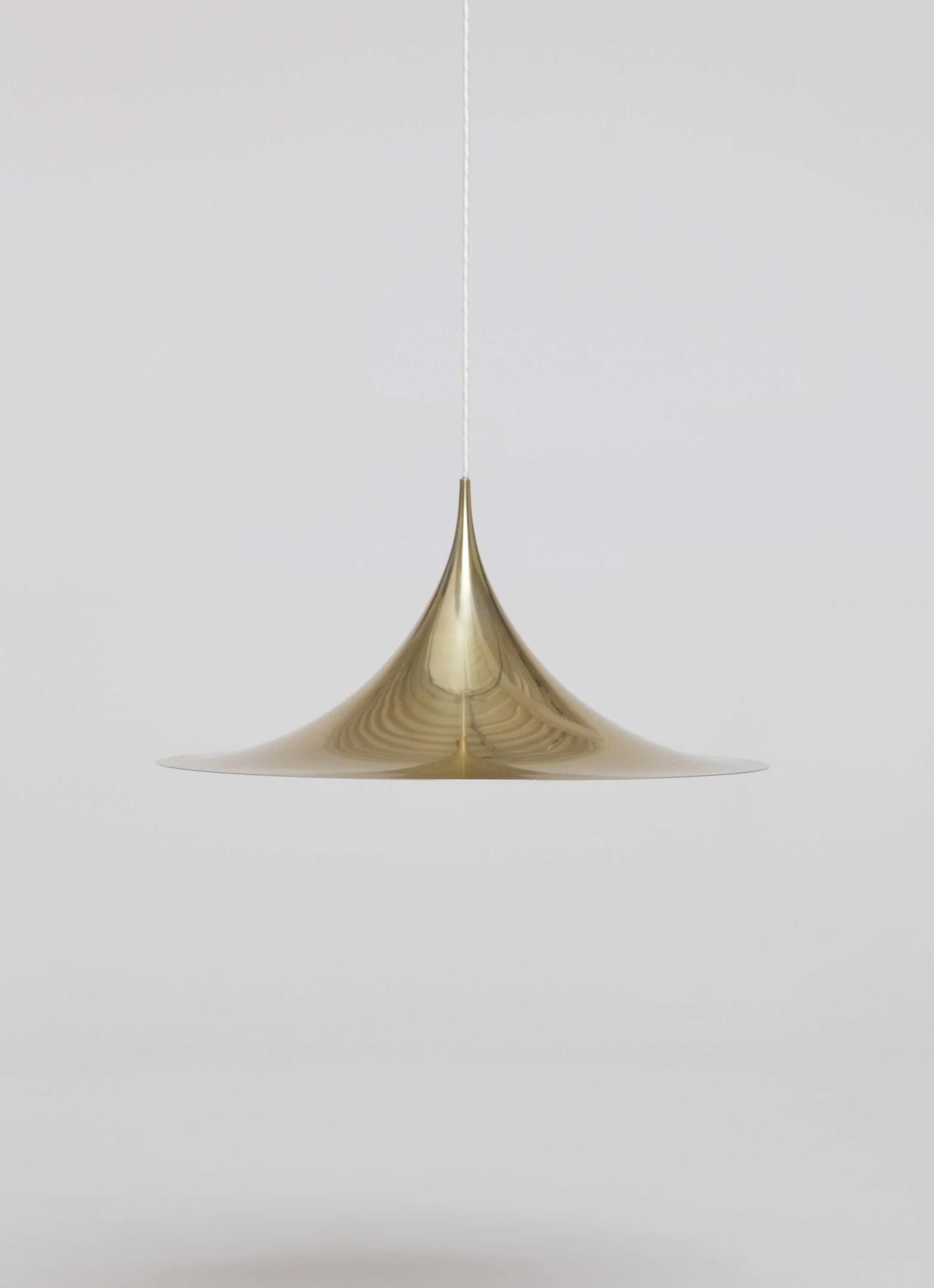 Claus Bonderup and Torsten Thorup designed brass semi Pendant. Manufactured by Fog and Mørup, Denmark, 1960s.

In good vintage condition only very minor marks / wear relative to age

Measure: Diameter 59cm.

Ships worldwide.
