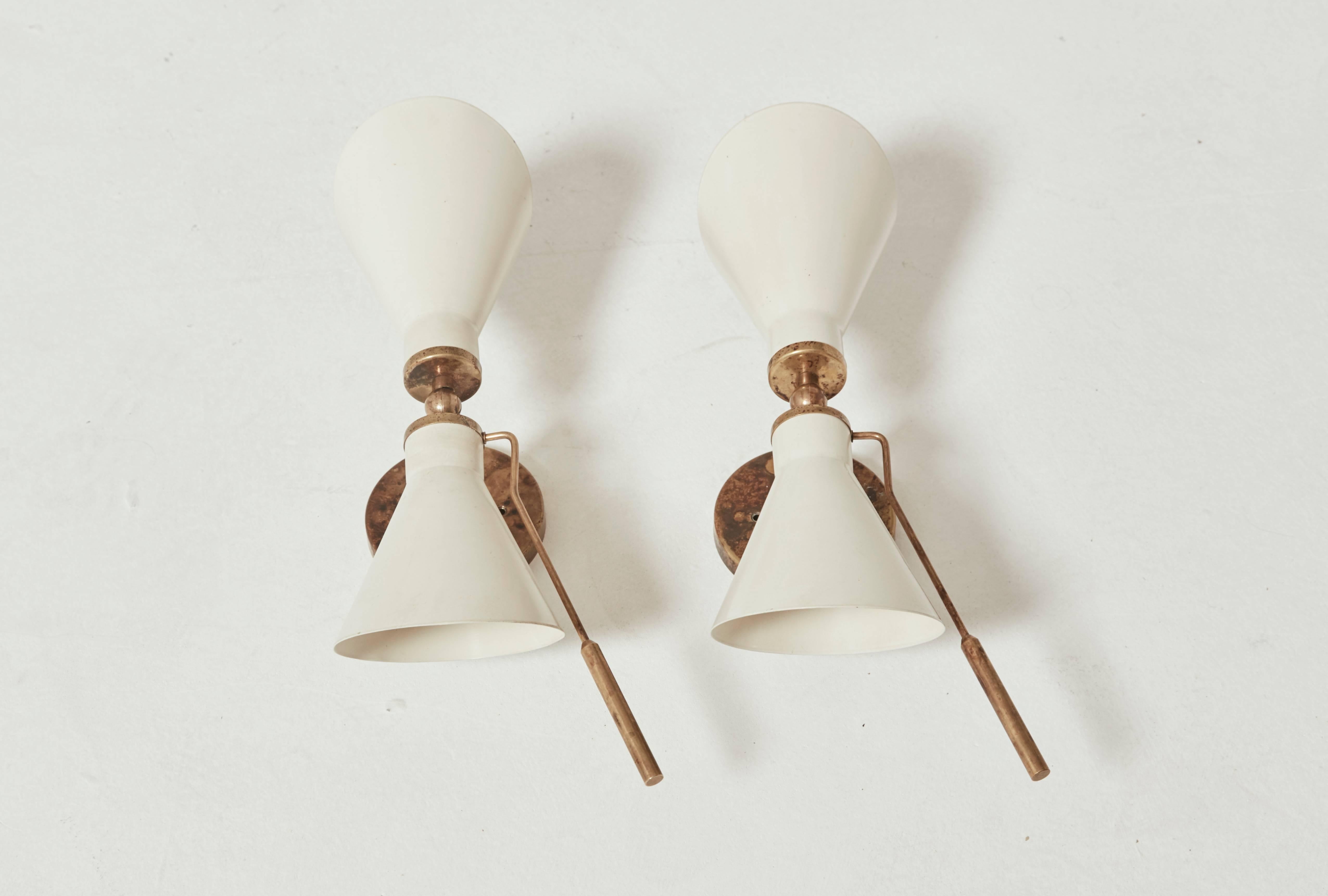 Wall sconces/lights Model 131 attributed to Gina Sarfatti, Italy.  Good original condition. Ships worldwide.

