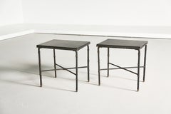 Raro par de mesitas auxiliares atribuidas a Jacques Adnet, Francia