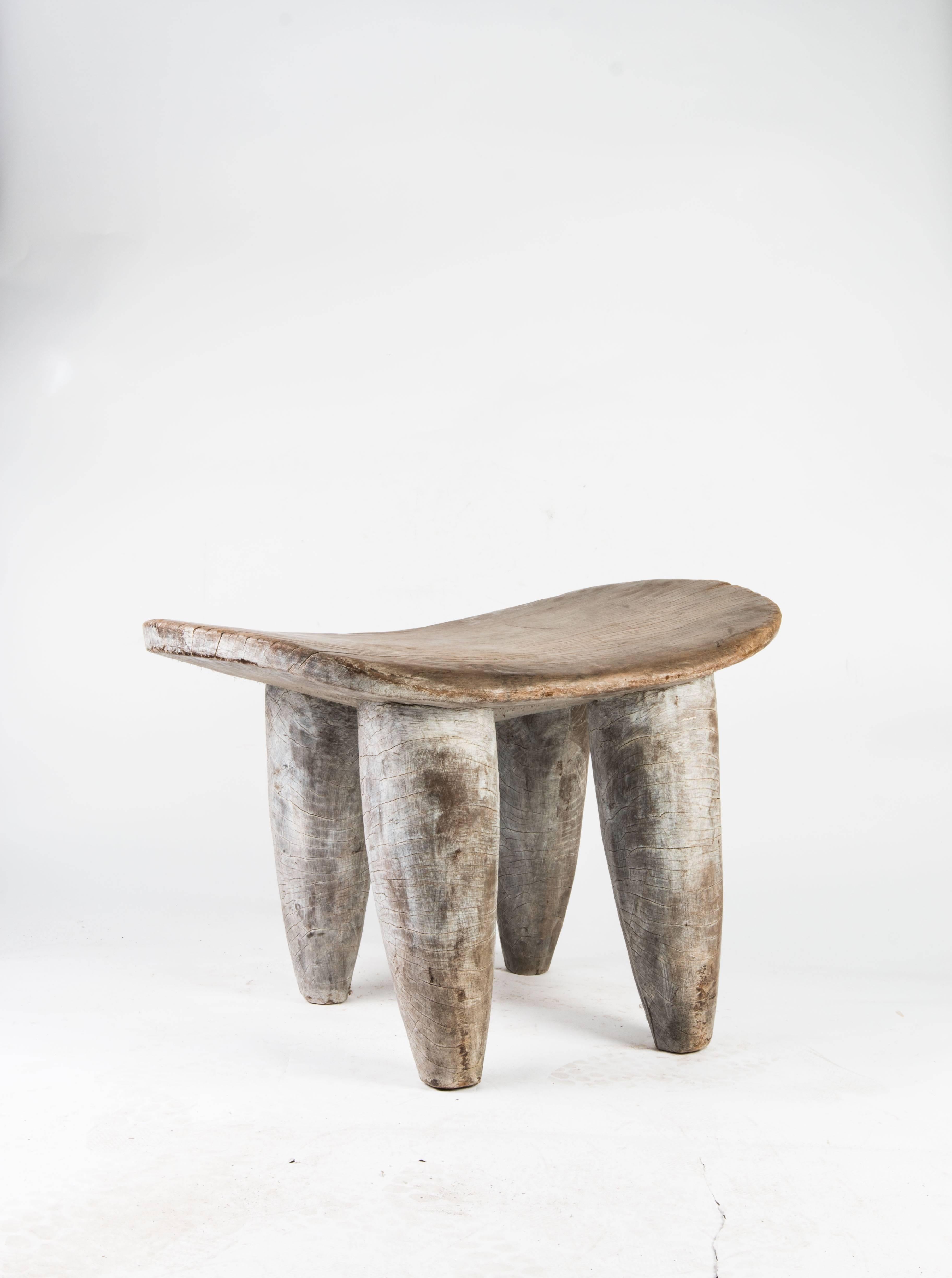 An incredible large sculptural Senufo stool. Handmade by the Senufo tribe, Cote d'Ivoire, Africa. Functional as a stool or table. Wonderful aged wood with natural patina. Ships worldwide.