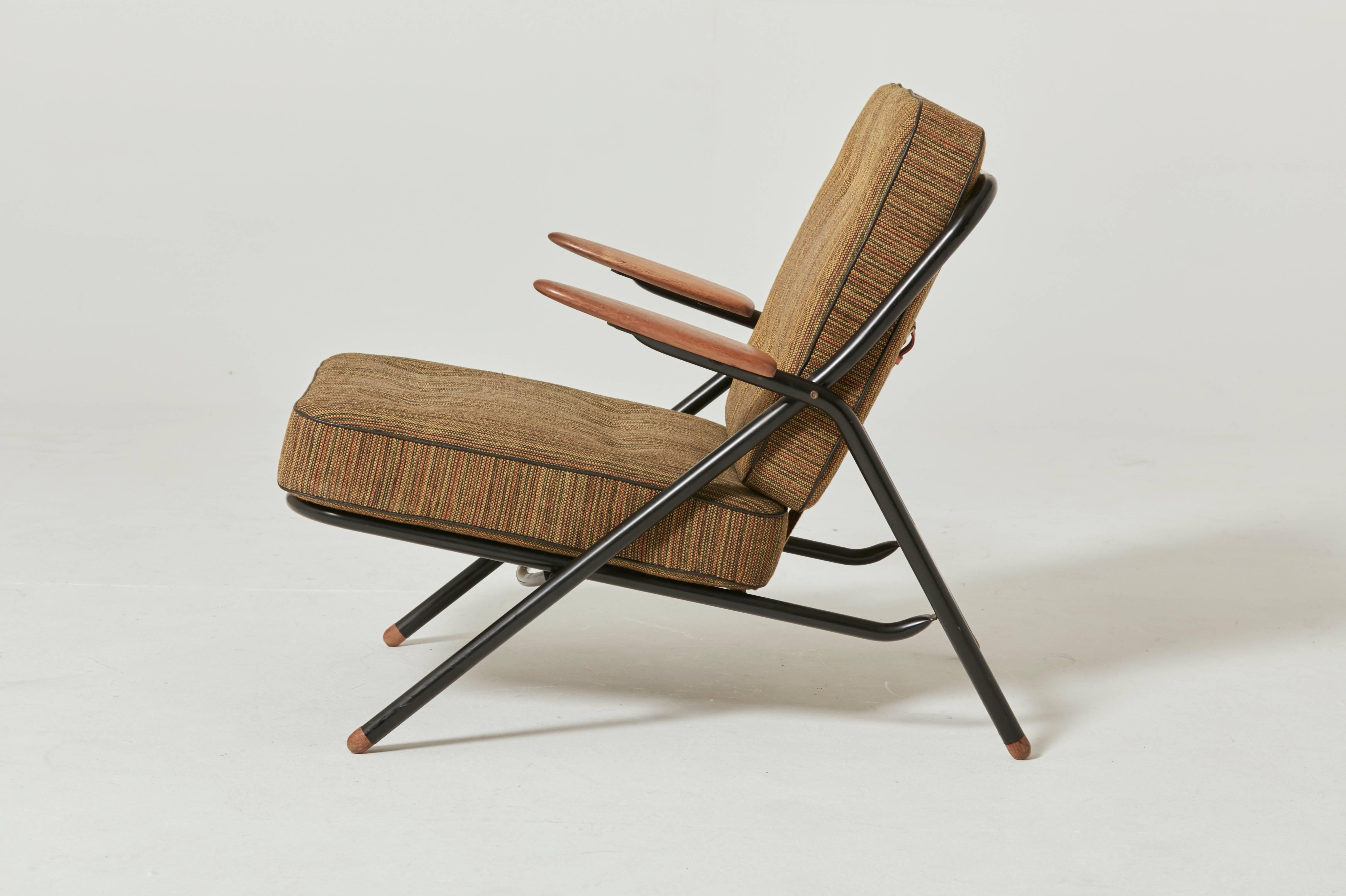 Rare Hans Wegner GE215 Sawbuck chair, Denmark, 1950s. Excellent condition. Ships worldwide.

This chair was shown at the 1955 great Nordic design exhibition in Helsingborg, Sweden. In this Wegner combined diverse materials, into one harmonious