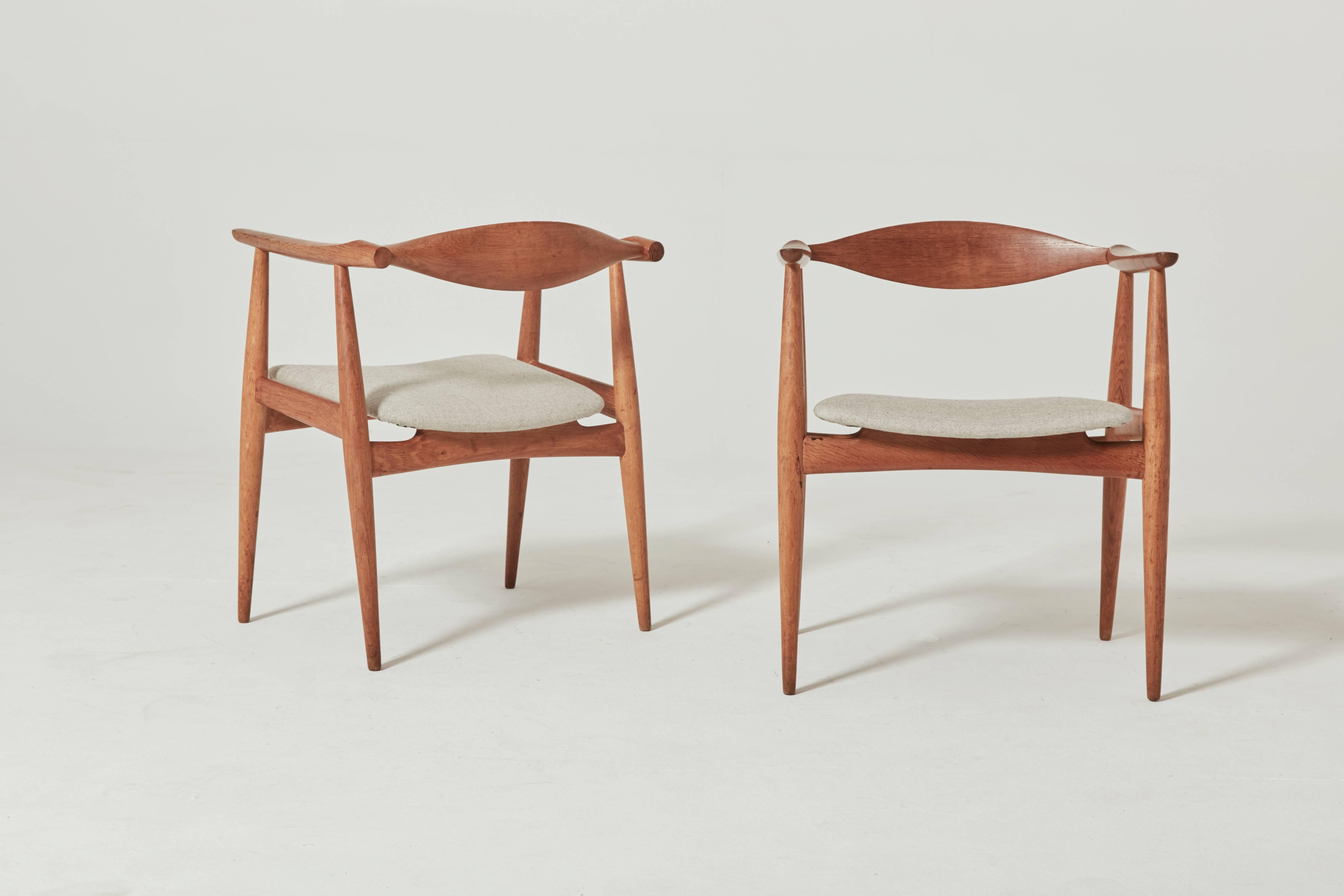 Hans Wegner CH-35 dining or desk chairs. Made by Carl Hansen & Son, Denmark, 1960s. Oak frames and Kvadrat wool fabric seats. Signed and branded with manufacturers mark to underside. Ships worldwide - please contact us for options.

