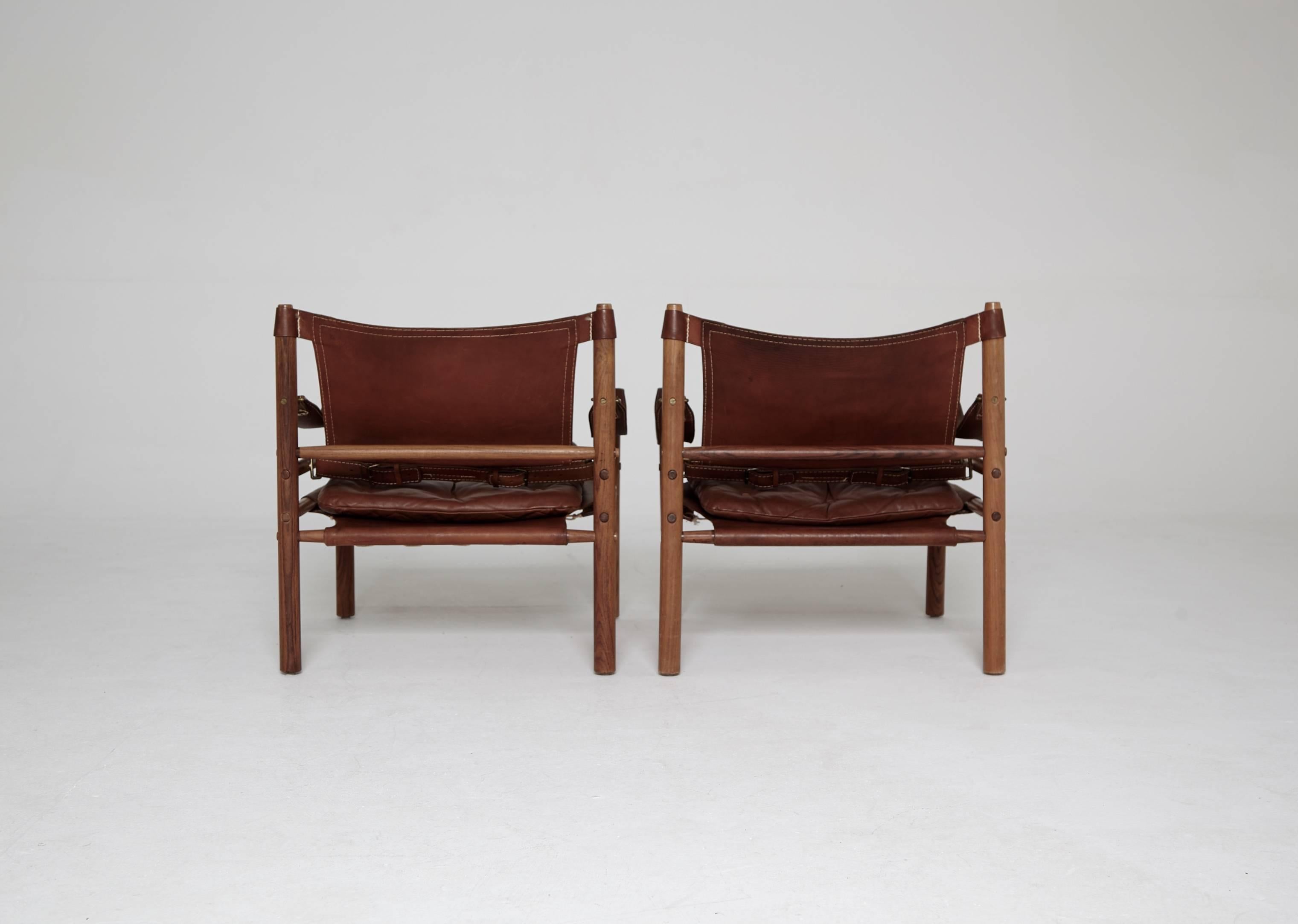 Mid-Century Modern Arne Norell Rosewood and Brown Leather Safari Sirocco Chairs, Sweden, 1960s