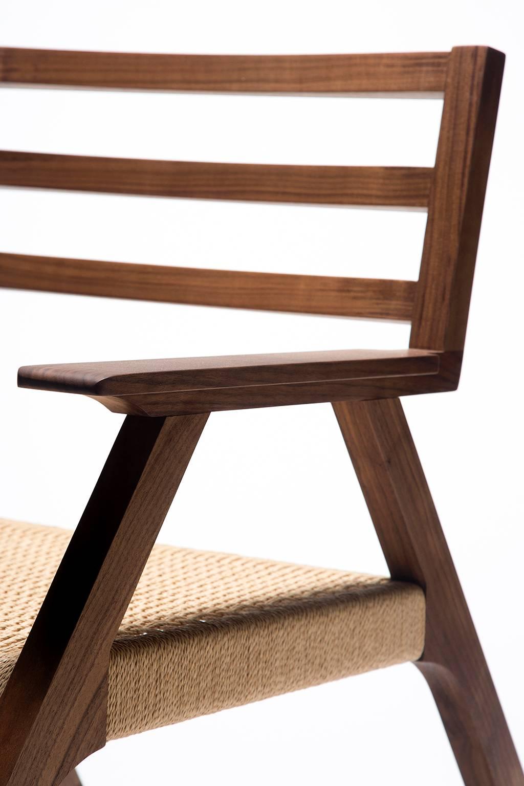 Our award-winning Giacomo rocking chair was the genesis for the Giacomo line of seating which now includes benches and chairs as well. Solid walnut construction and a handwoven danish cord seat. Also available in other species or finishes.