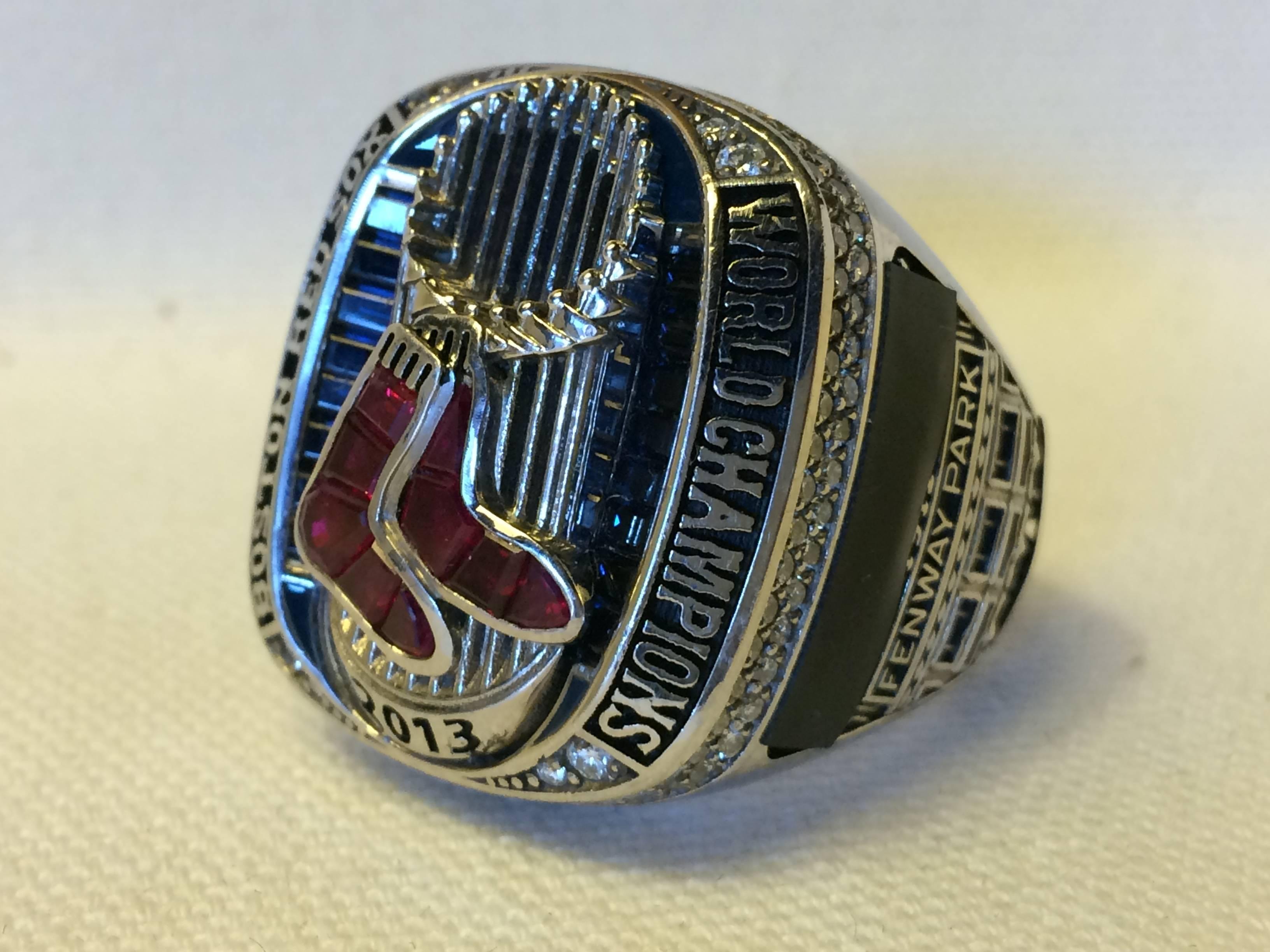 2013 Boston Red Sox World Series Championship ring. Coaching staff members ring, size 10.5-11, weight 58.8 grams. All REAL genuine diamonds over 126 total diamonds, brilliant cut, si gh color. Genuine real rubies, 2.5 carets custom cut, 16
