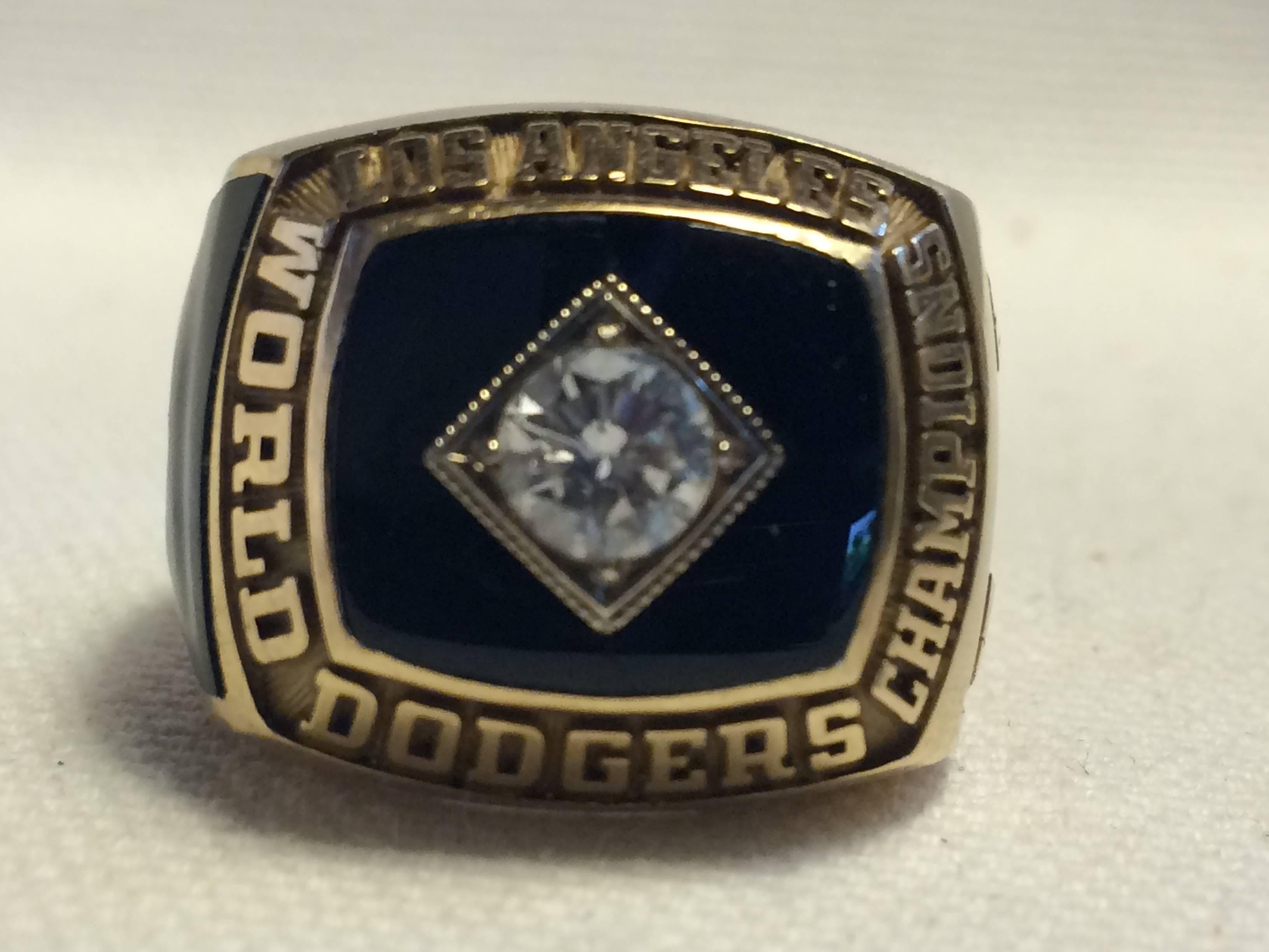 1981 Las Angeles Dodgers World Series Championship ring, made of 14-karat gold, genuine high grade diamond. This ring is an original issue, authentic Staff members ring. Guaranteed authentic. Weight is 29.2 grams of 14k gold, size 10-10.5. This ring