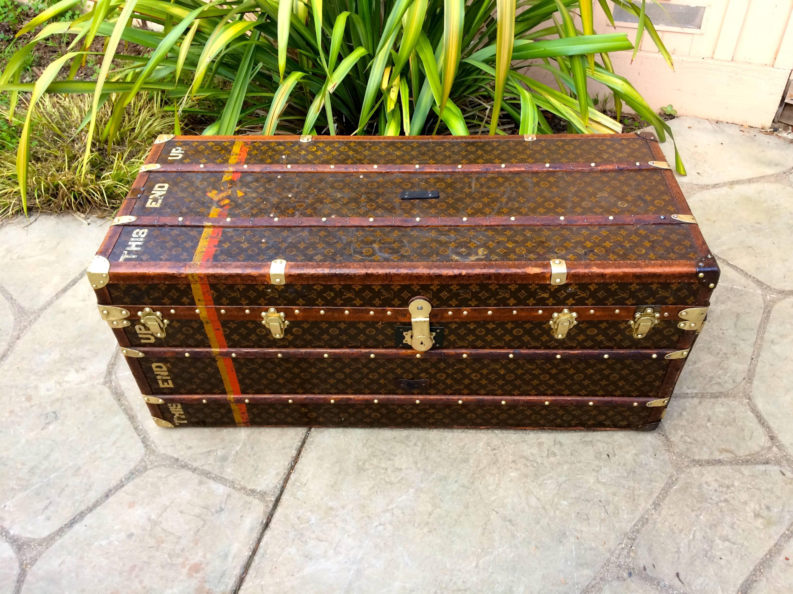 Magnificent extra large antique Louis Vuitton steamer trunk. This trunk measures in inches 22 x 23 x 52.