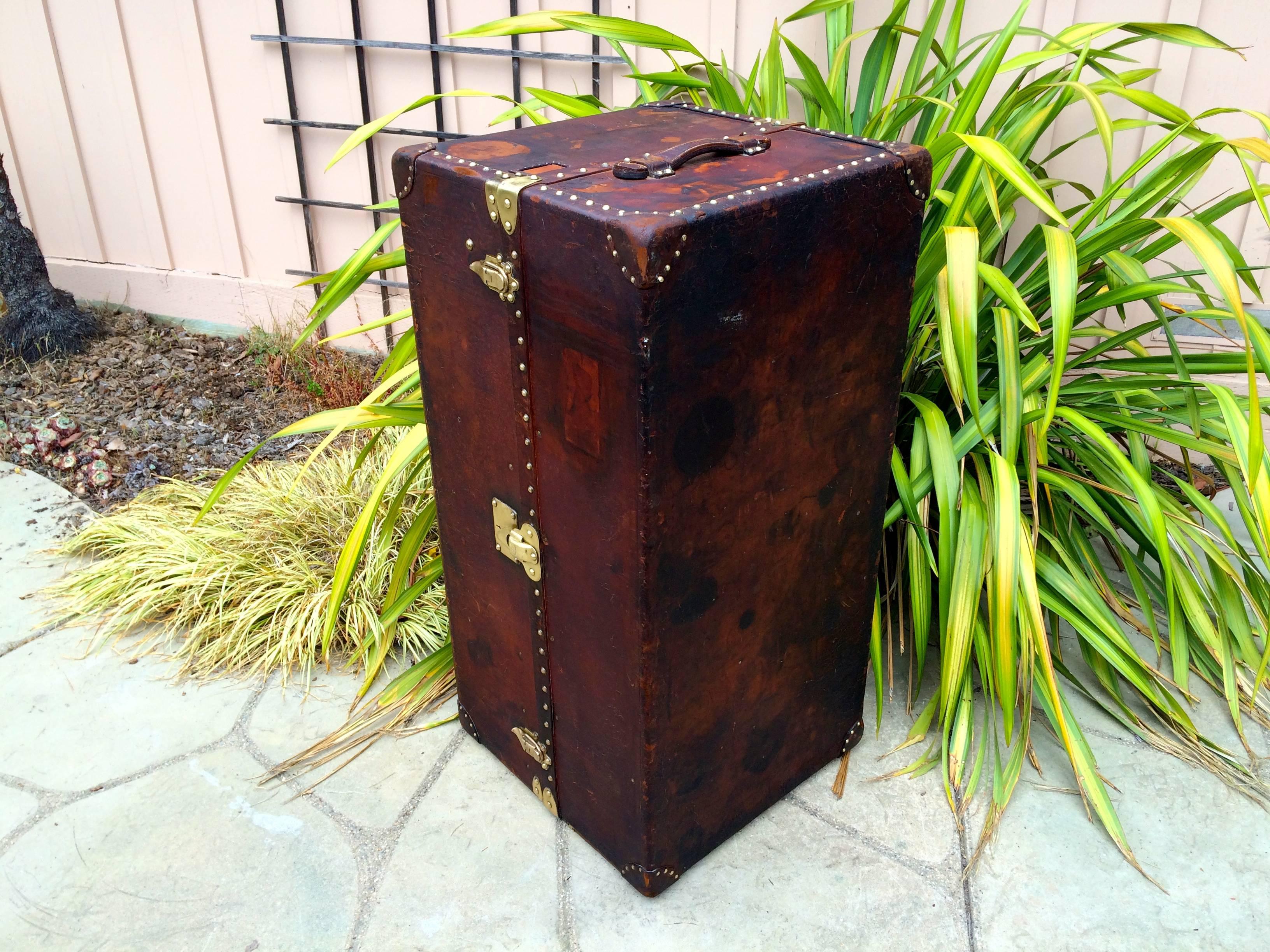Louis Vuitton antique leather wardrobe steamer trunk. This trunk has all original pieces including interior and exterior with all original latches, handles, drawers and hangers. Interior is in spectacular condition with hangers and original drawers.