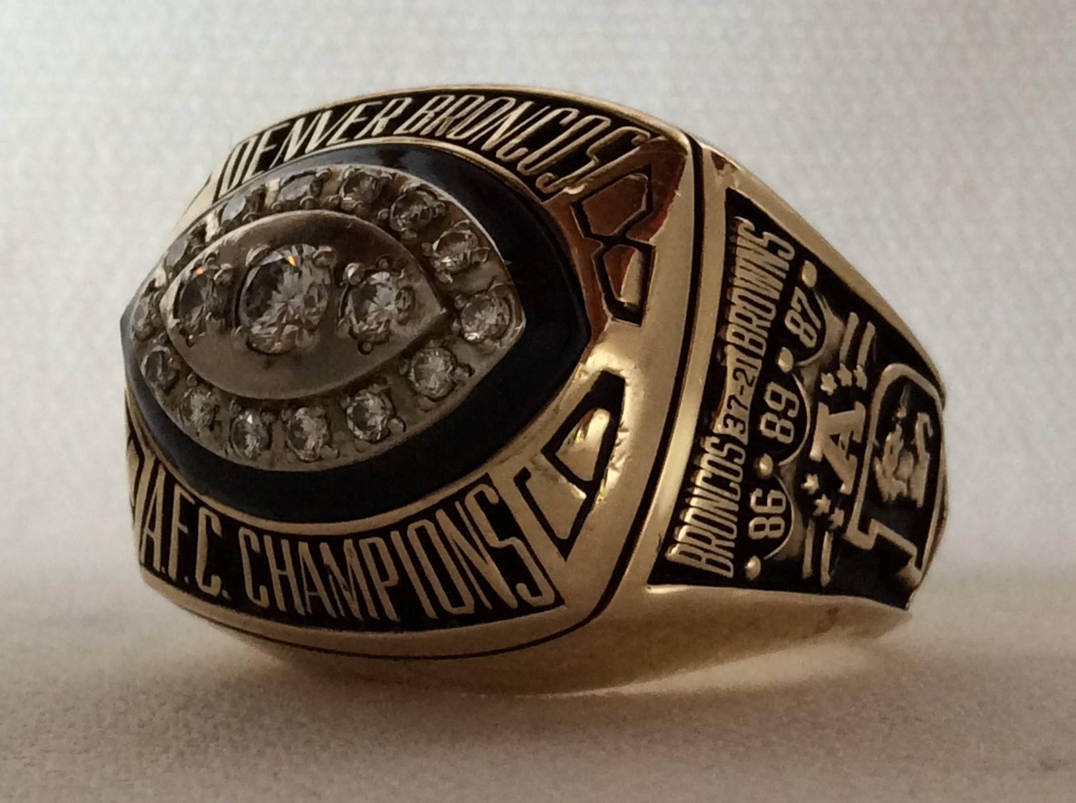 1989 Denver Broncos AFC Championship super bowl players ring. Ring is manufactured by Jostens, made of 10-karat gold with all real, genuine high grade diamonds. This ring is an original issue, authentic practice players ring. Guaranteed authentic.