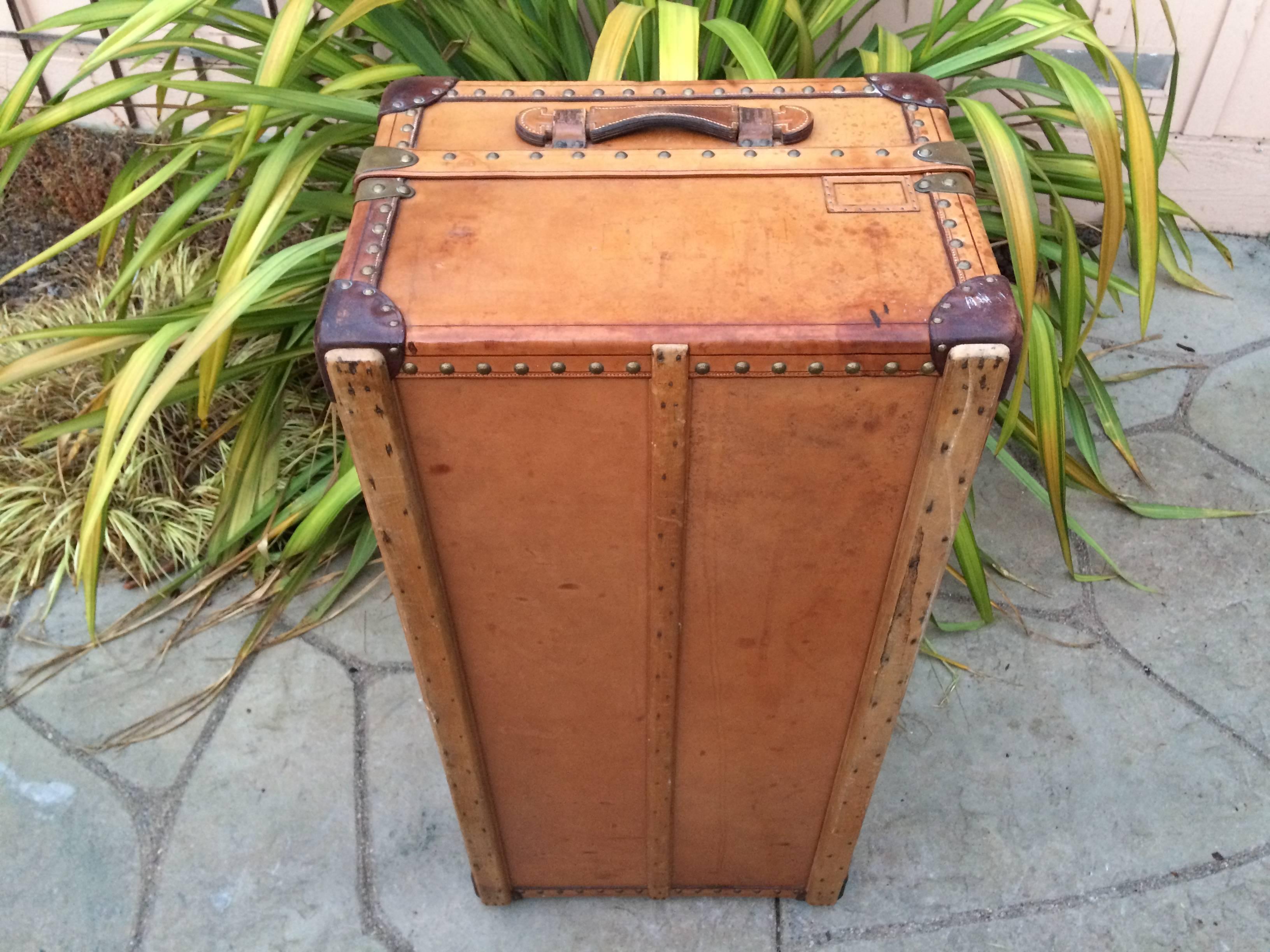 Magnificent, unrestored, original and untouched antique Louis Vuitton leather steamer wardrobe trunk. This trunk is truly in magnificent unrestored condition. Trunk measures in inches 17 x 22 x 45. This gorgeous Louis Vuitton