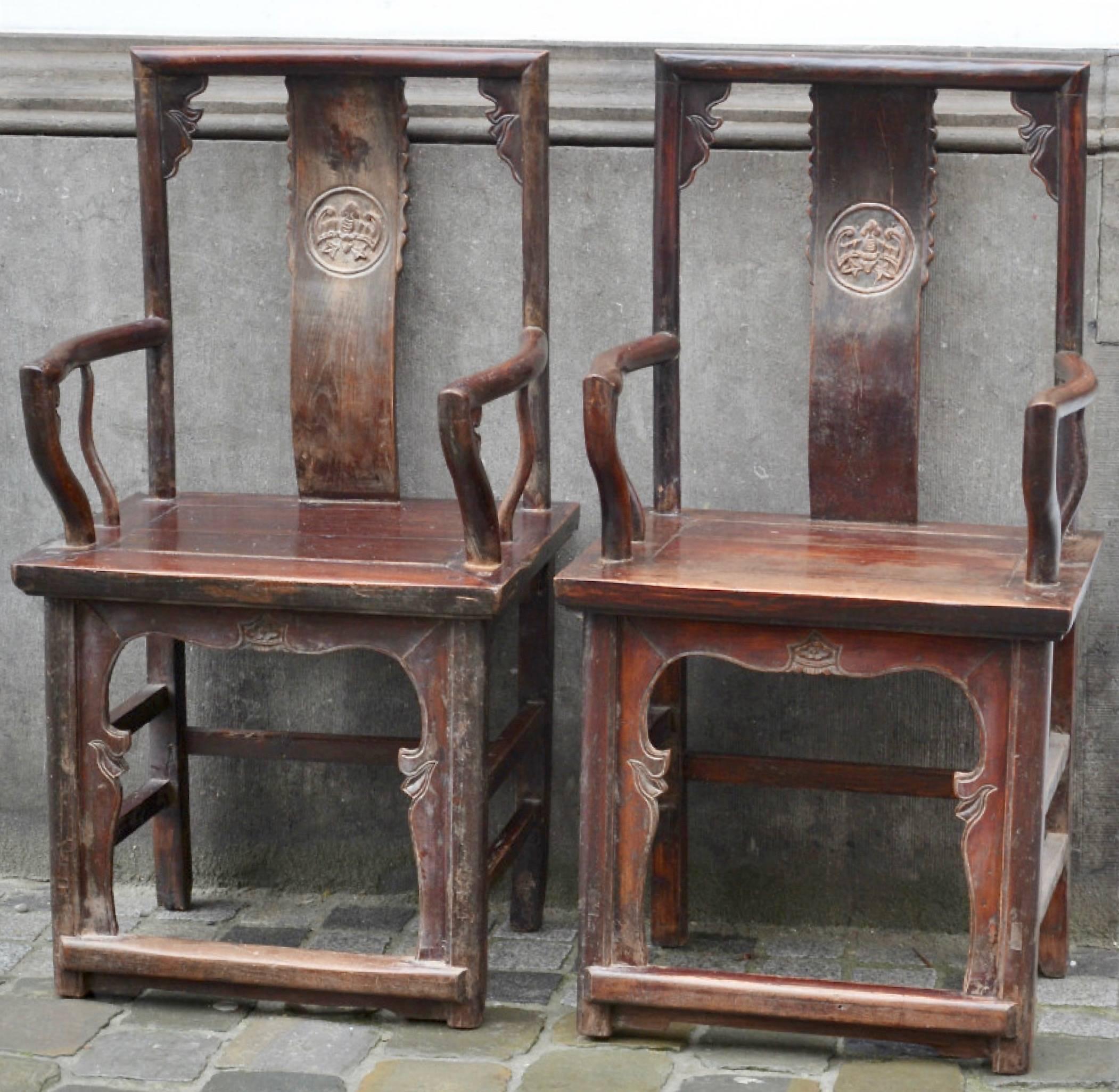 Pair of armchairs in carved elm. 
Qing dynasty, China.
