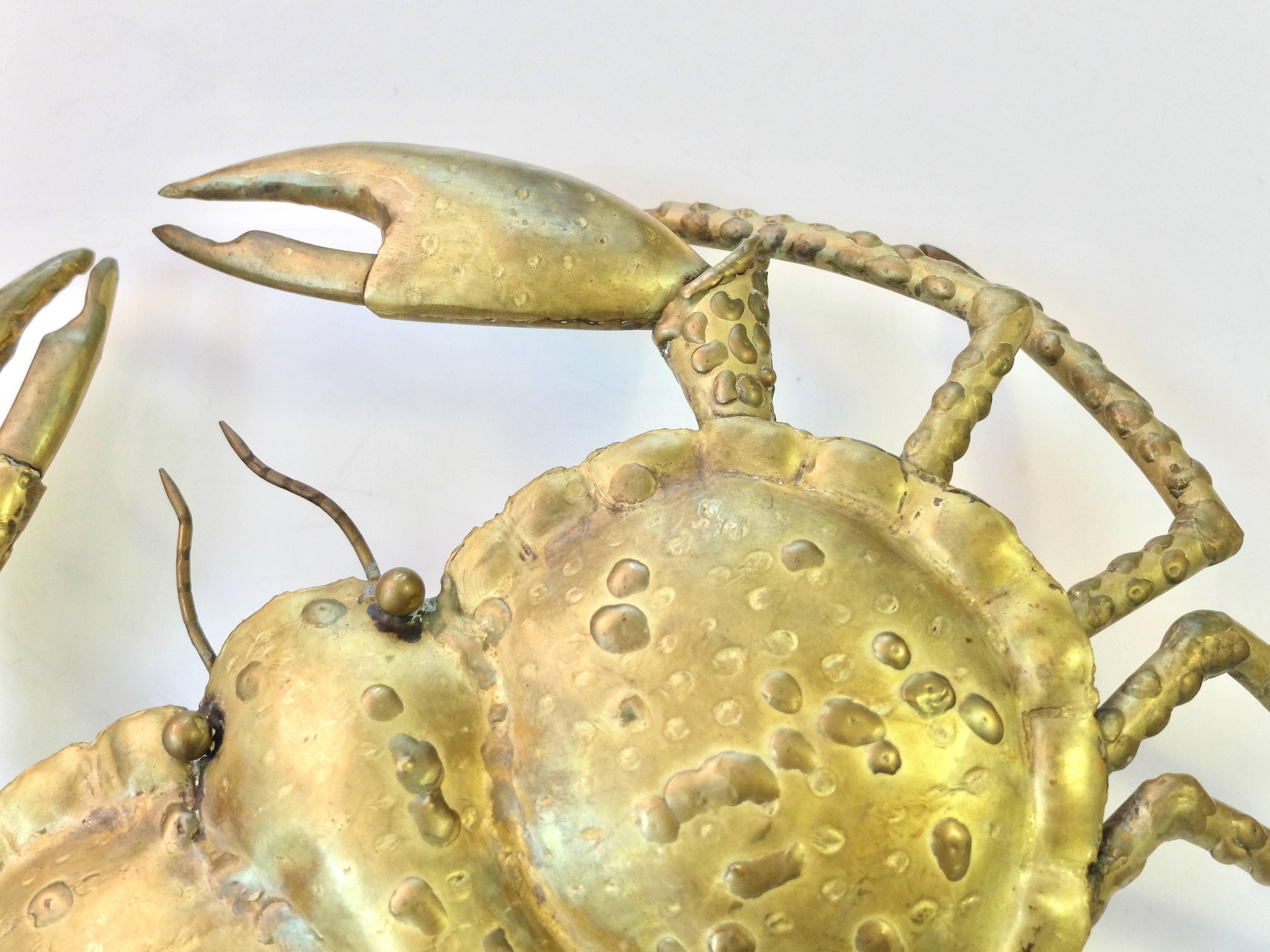 Pair of brass wall lamps representing two crabs; signed on the back P. Mas-Rossi.