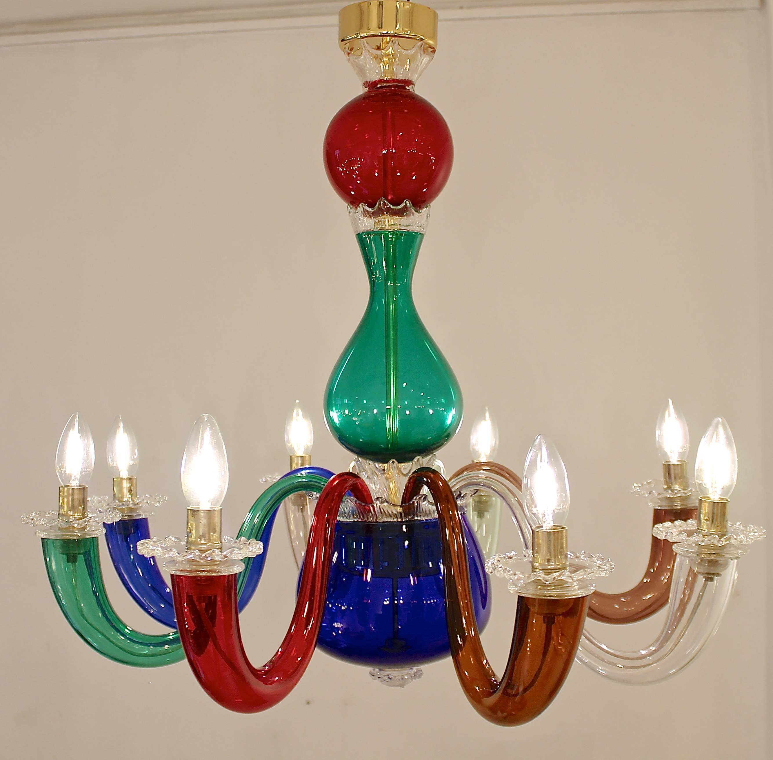 Pair of Gio Ponti for Venini Murano chandeliers in multicolored blown glass.