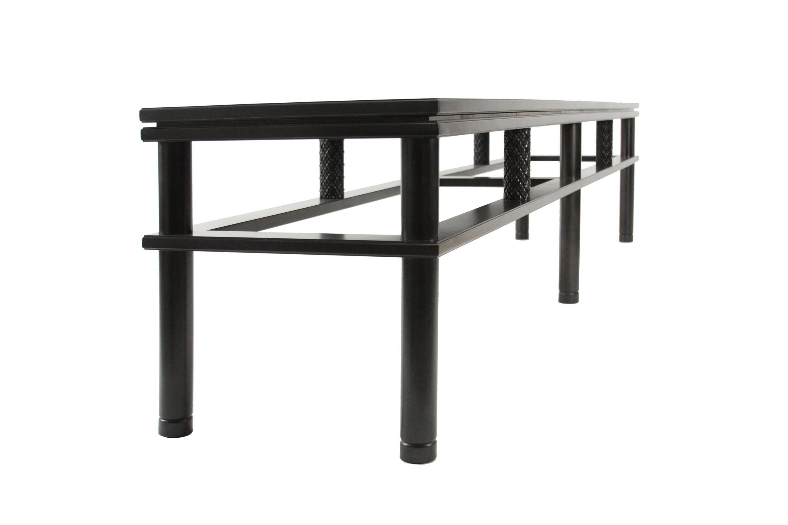 Designed in 2016, the Olneyville console or media table is perfect as a long entry surface. Can also be used as a bench, behind a sofa, or as a media console. Ebony stain is black. Solid maple hardwood. Measures: 108