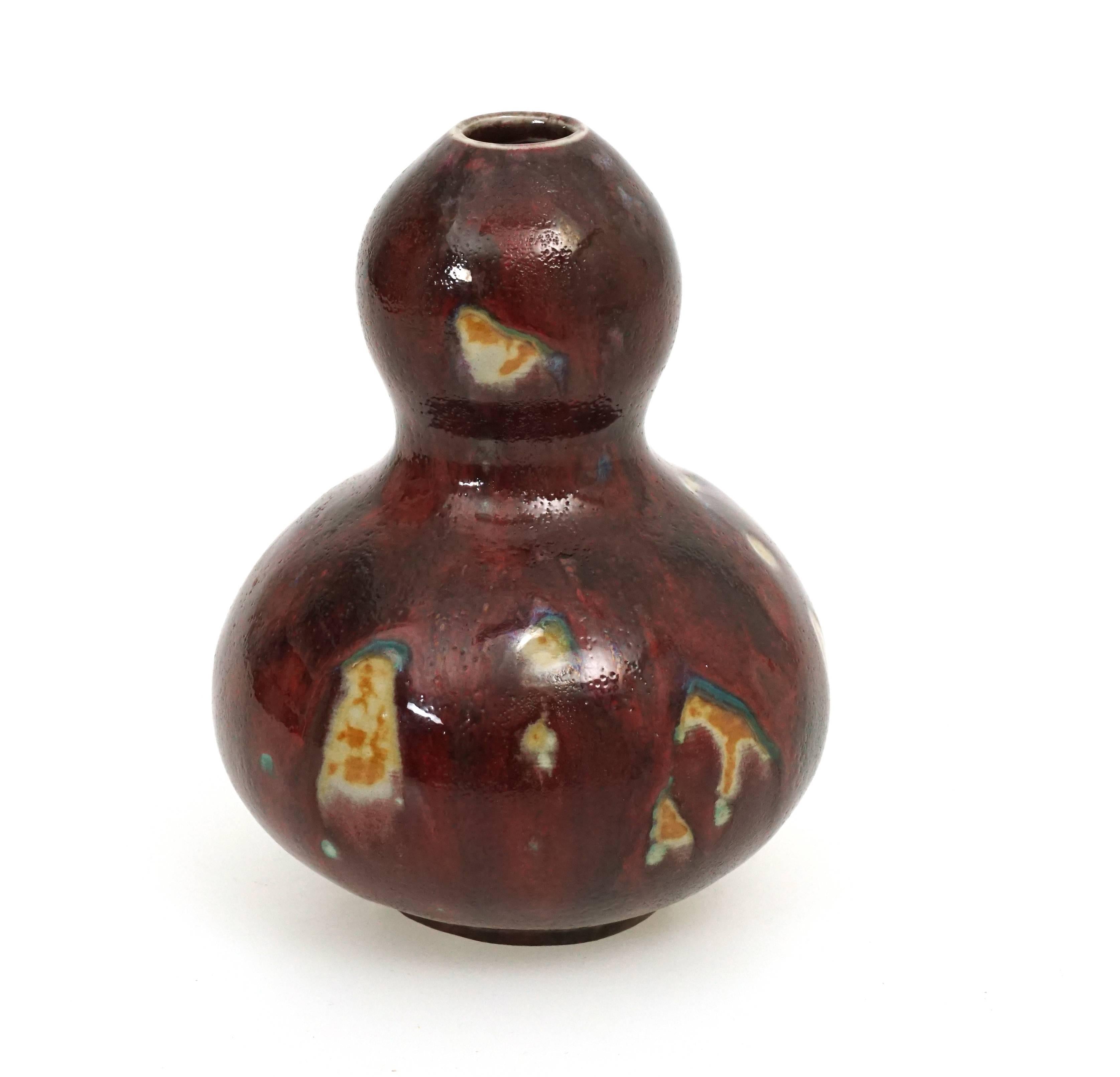 Axel Salto, 1889-1961, for Royal Copenhagen. Calabash-shaped vase, stoneware. Rare Oxblood glaze. Signed 