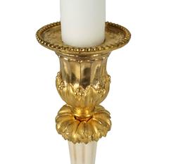 Rare Set of Four Empire Marble and Gilt Bronze Candlesticks, France, circa 1810