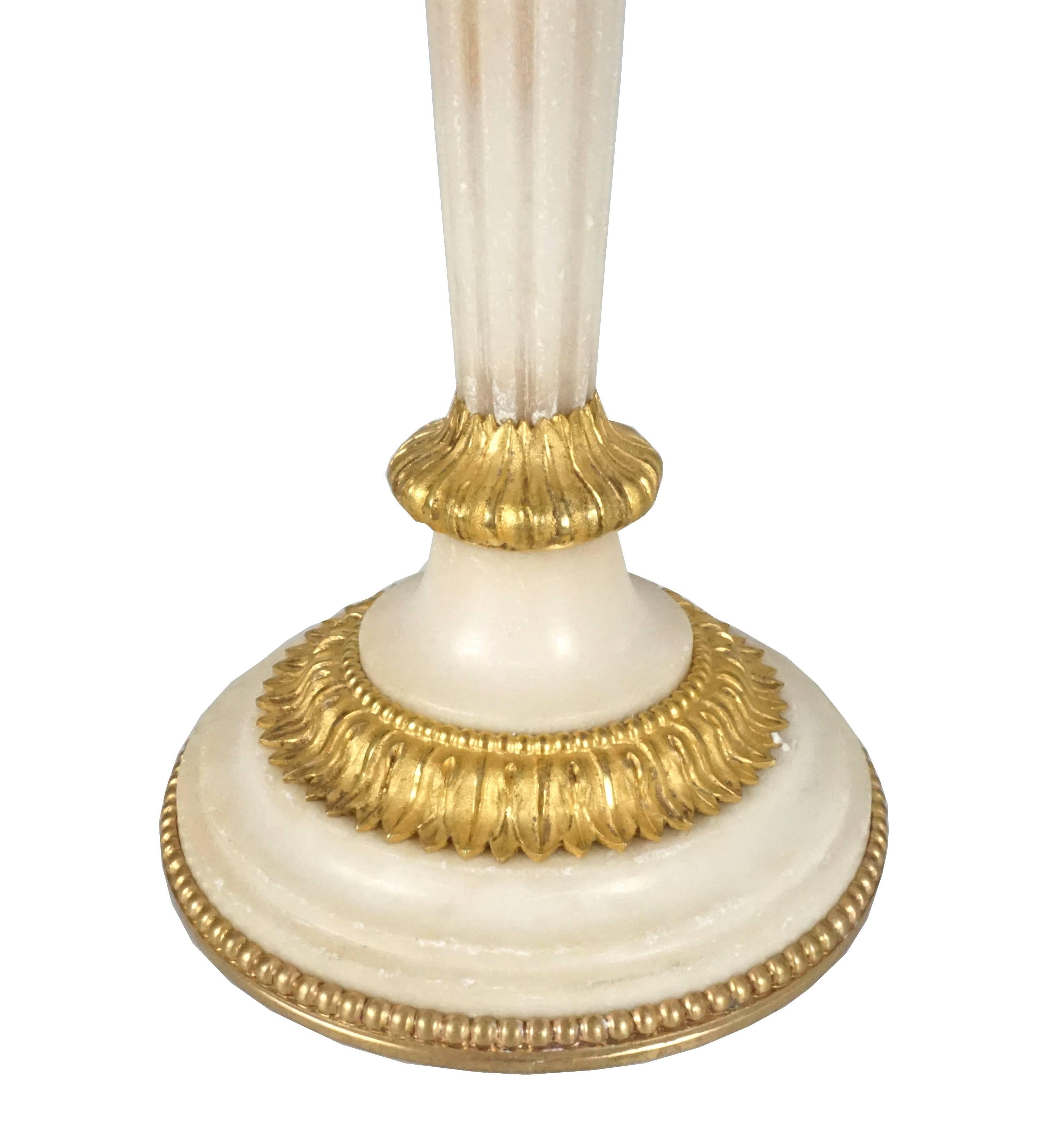 French Rare Set of Four Empire Marble and Gilt Bronze Candlesticks, France, circa 1810 For Sale