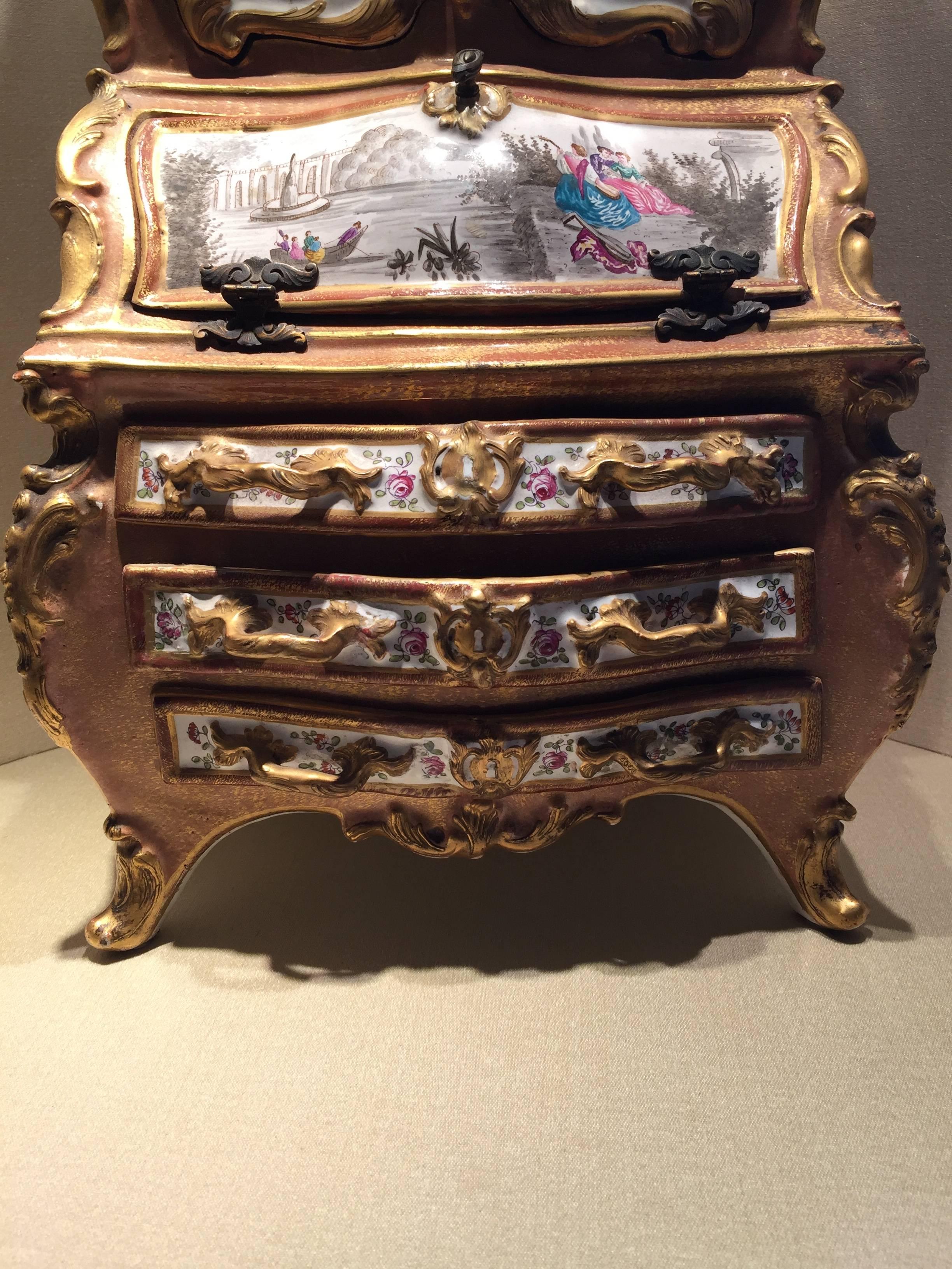 An amazing porcelain cabinet with landscapes and Classic figures hand-painted, floral decorations on white background inside made by Sèvres manufacturing in 1870. Hallmark on the back.