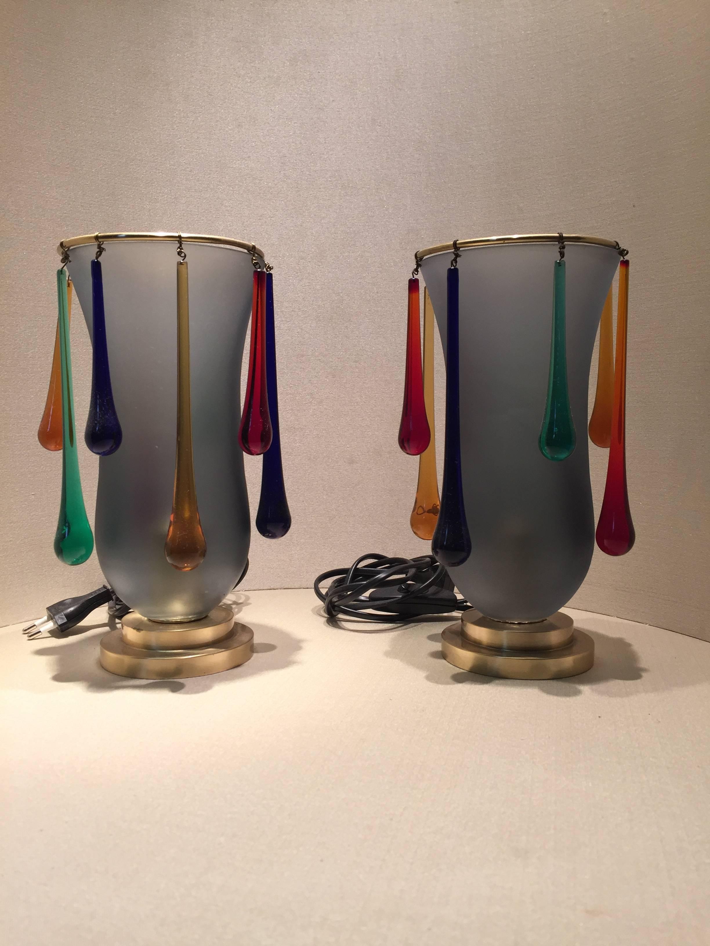 Beautiful pair of table lamps with glass pendants, brass base.
Made by Stefano Toso glass factory