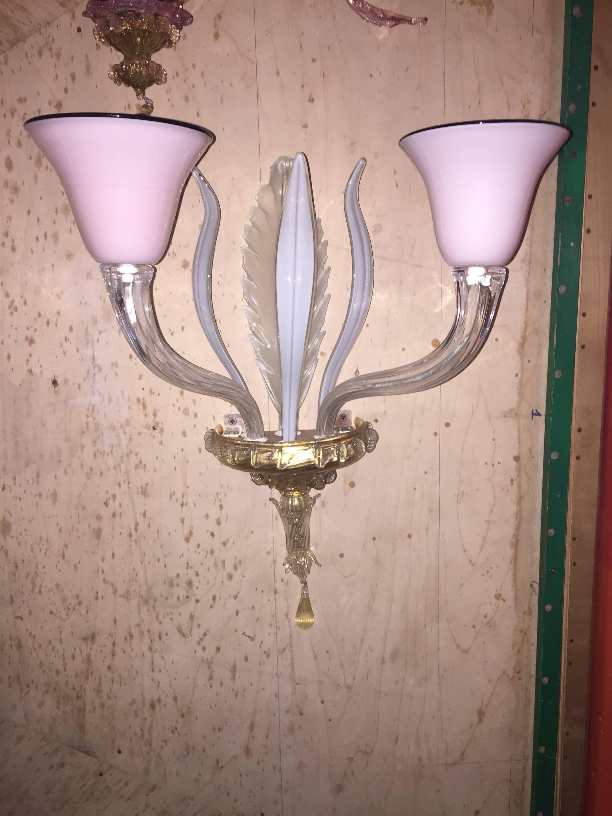 A beautiful two arms Murano glass sconce made by Salviati glass factory.

Check other beautiful items in our storefront page.