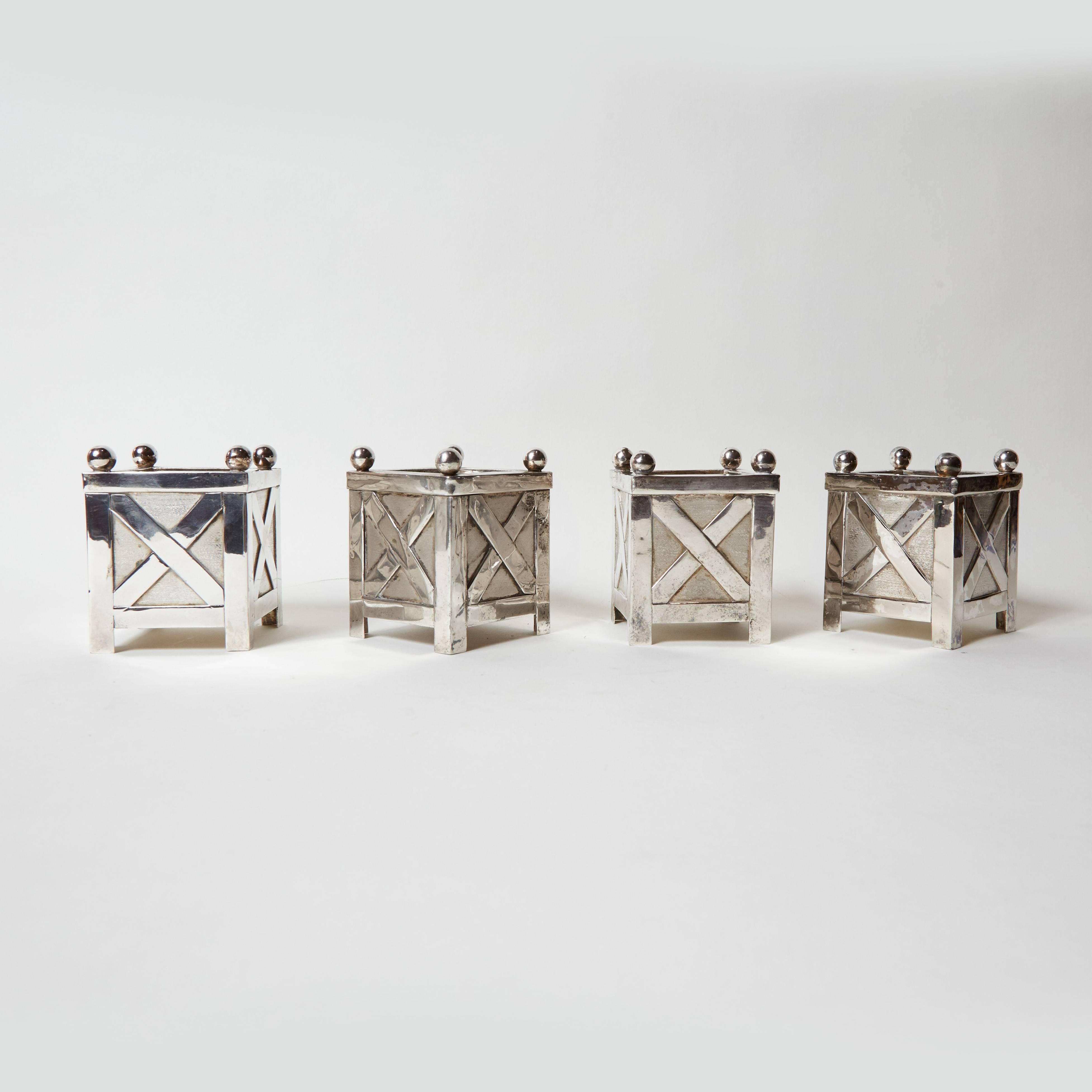 Four miniature planter boxes silver.
For candles or flowers.
 