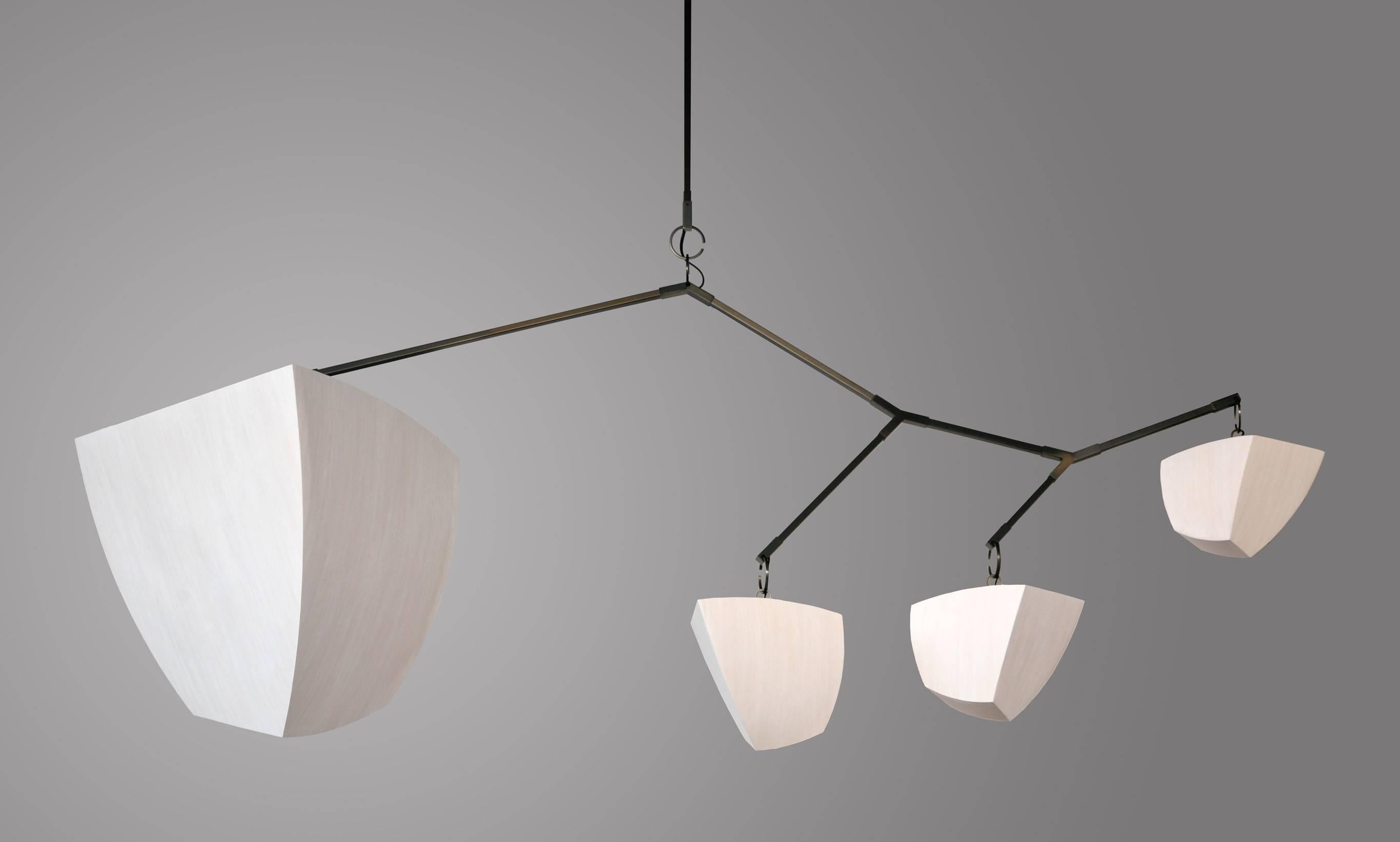 Our unique mobile chandelier can be configured into many variations, extended both vertically and horizontally. We work closely with our designers to explore what will work perfectly for their projects. Utilizing 3D models, full scale mock-ups, and