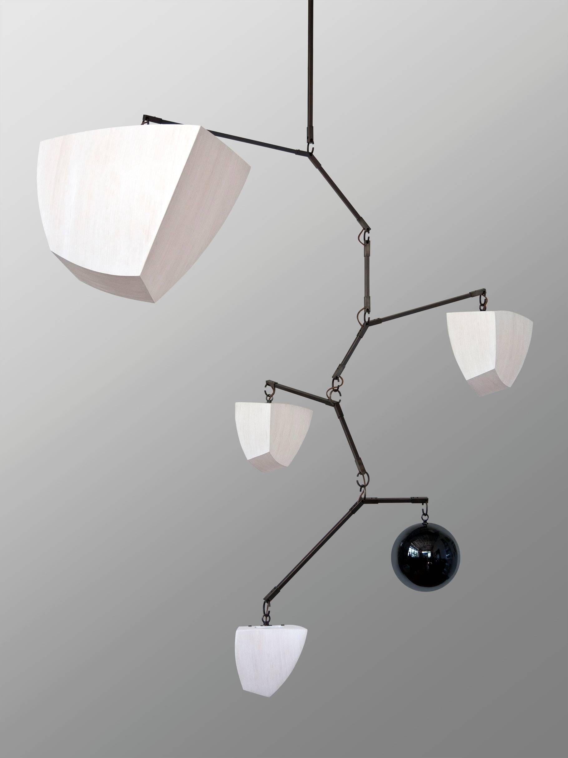 Ivy 5 Bamboo V2: ABCDF is a large mobile chandelier with 4 glowing bamboo polyhedrons, arranged in size order and a glass metal globe. The Ivy Series is a vertically oriented variation which mimics the shape of Ivy vines and it designed for larger,