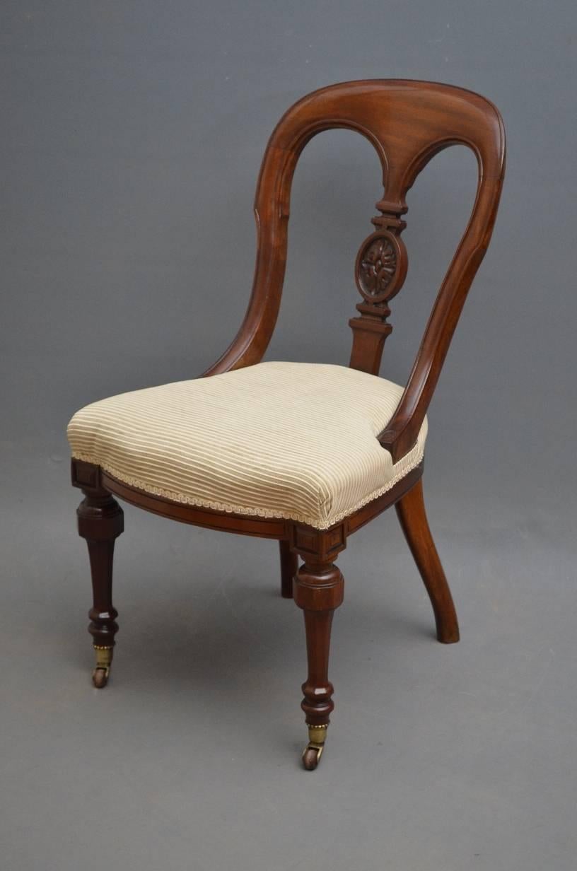 Sn3134, fine quality early Victorian set of eight mahogany dining chairs of elegant design, having shaped top rail with attractive carved detail to ends and flower carved centre splat, fully upholstered seats and shaped front rail, all standing on