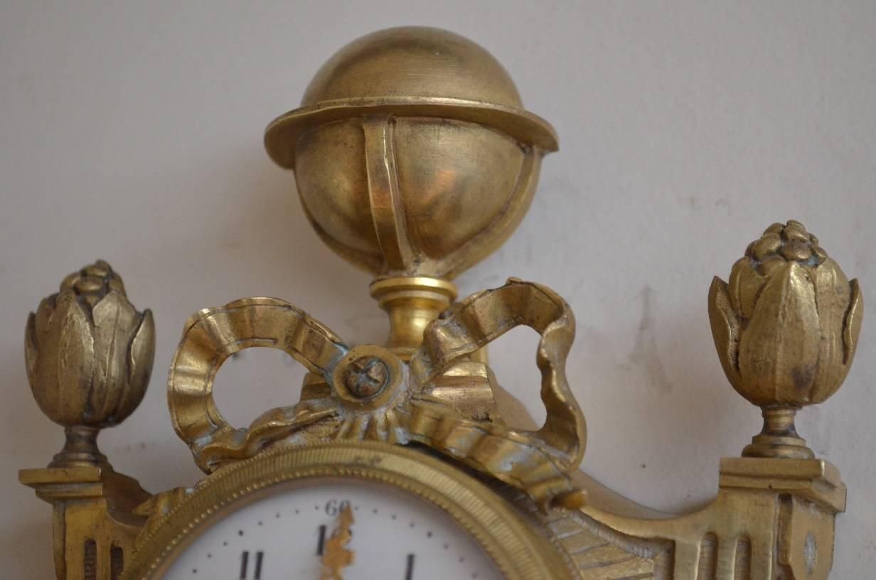 Sn3241, fine continental, gilt metal wall clock of unusually small proportions being only 12