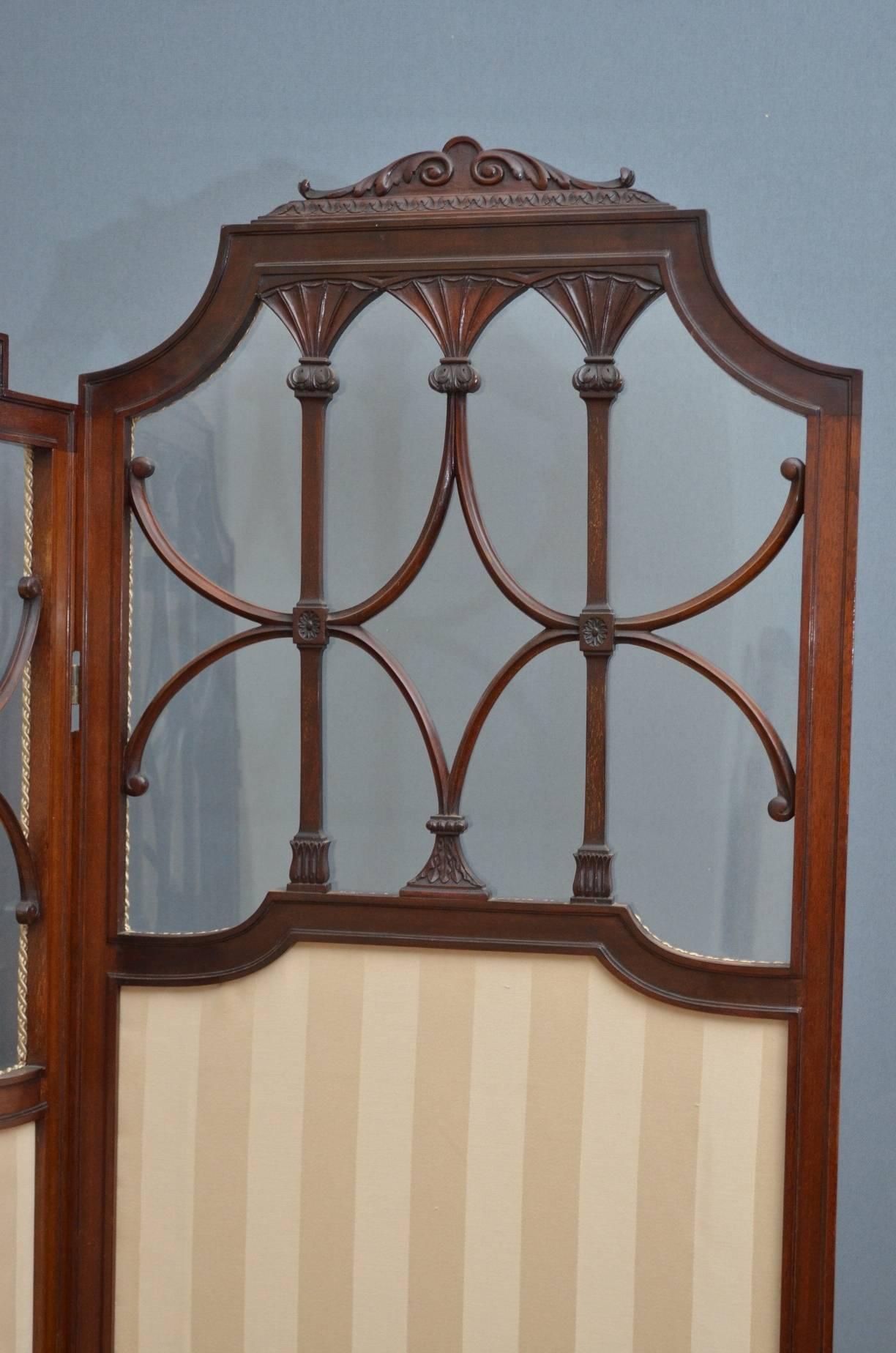 Sn3483, exceptional Edwardian, mahogany room divider, having three shaped glazed panels in finely carved frame and new clean fabric, standing on shaped feet. This is a very pretty and decorative piece in excellent condition throughout, ready to