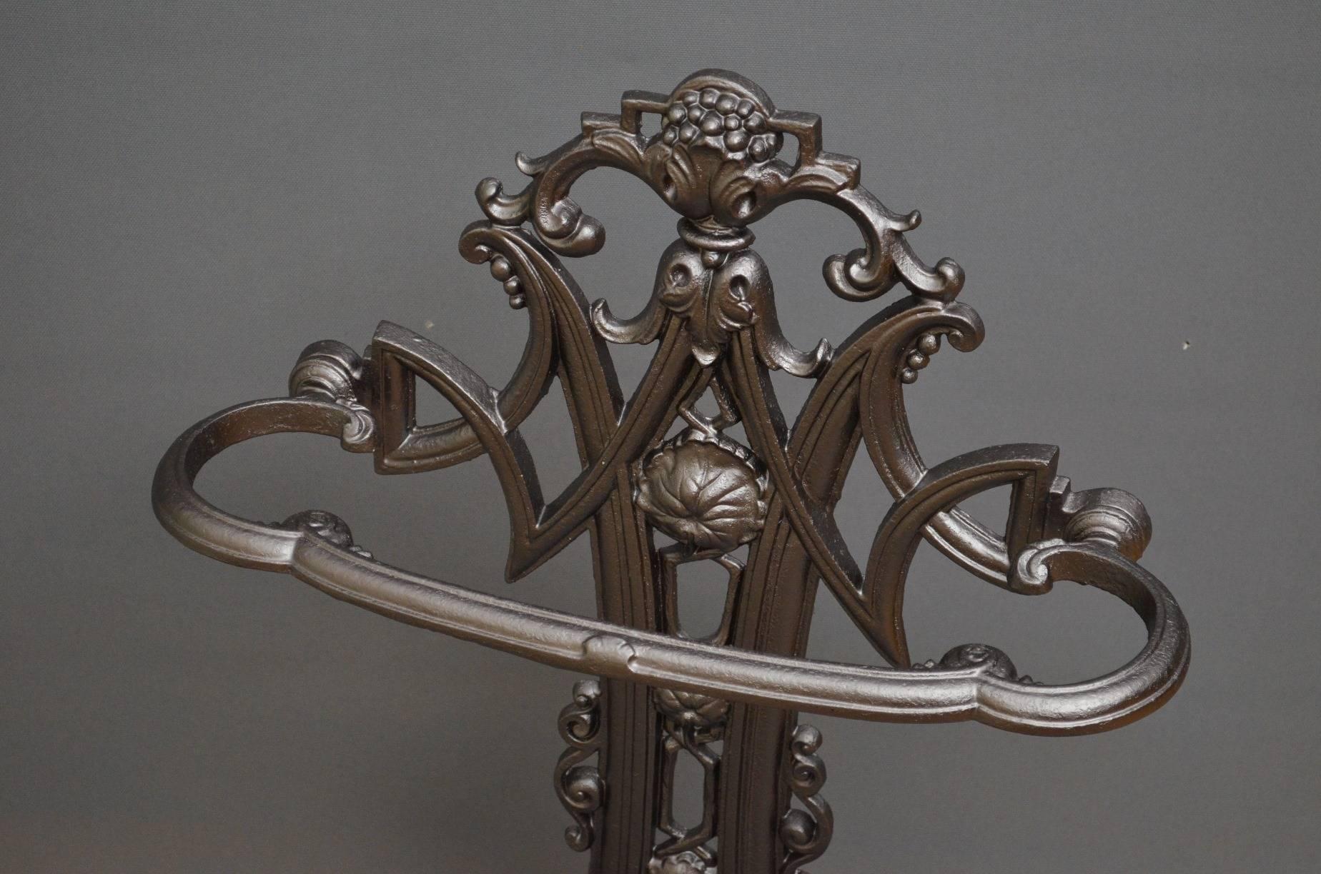 K0222 Stunning Art Nouveau cast iron walking stick stands having attractive floral design with shaped umbrella holder and removable drip tray. This Art Nouveau hall stand in in excellent condition throughout, ready to place at home, circa