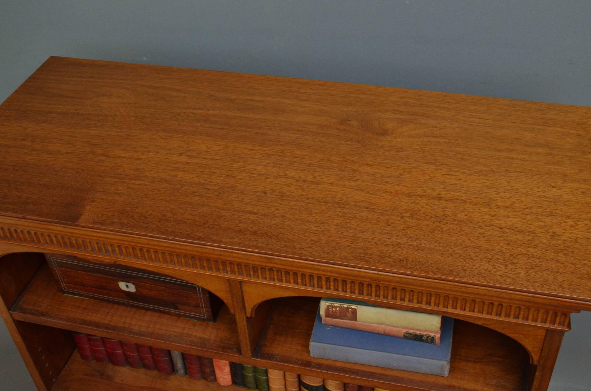 Sn3853, a good example of Victorian solid walnut dwarf bookcase, having attractive figured top with fluted frieze, 2 arched divisions and height adjustable shelf, all standing on moulded plinth base. This low bookcase has been sympathetically