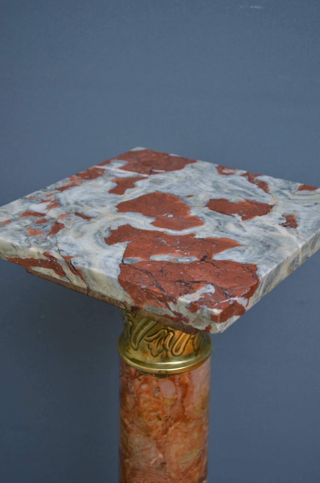 Sn4138 a very rare pair of matching red and pink veined marble columns each having brass collar to top and to stepped base. This pair has been constructed with three different colored marbles. All in wonderful condition, ready to place at home,