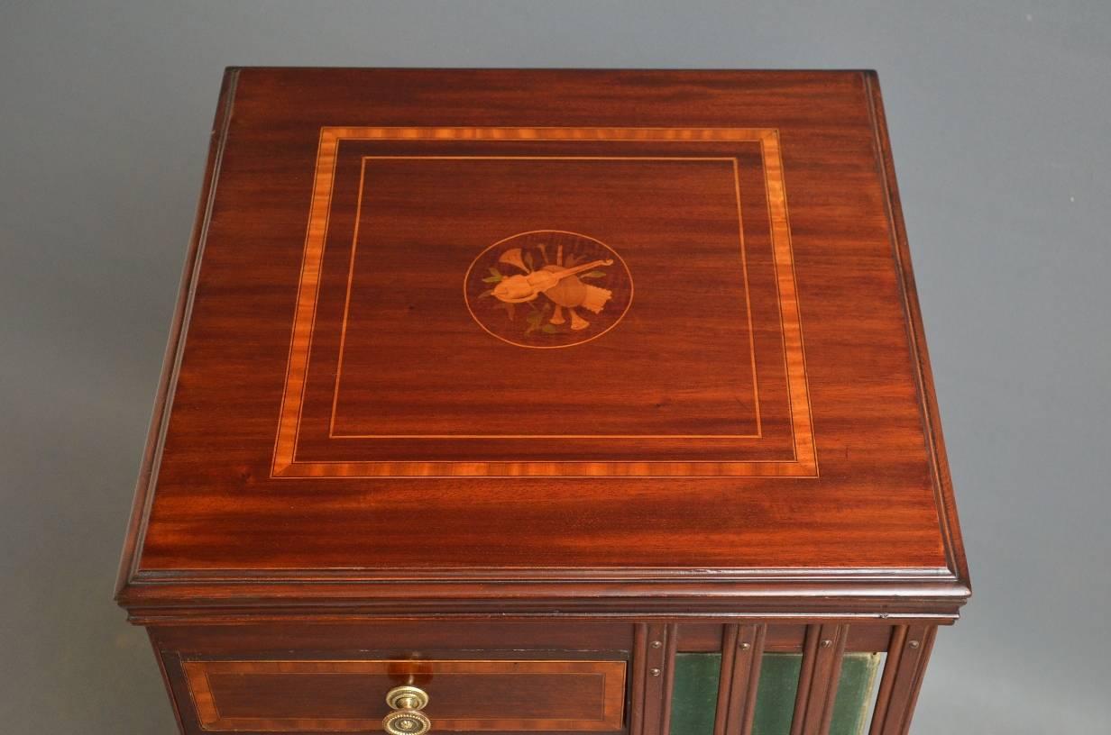 Sn2883 Unusual late Victorian, mahogany, revolving bookcase with three drawers, having figured mahogany, moulded and satinwood crossbanded top with finely inlaid centre, slated sides and 3 satinwood crossbanded drawers fitted with original brass