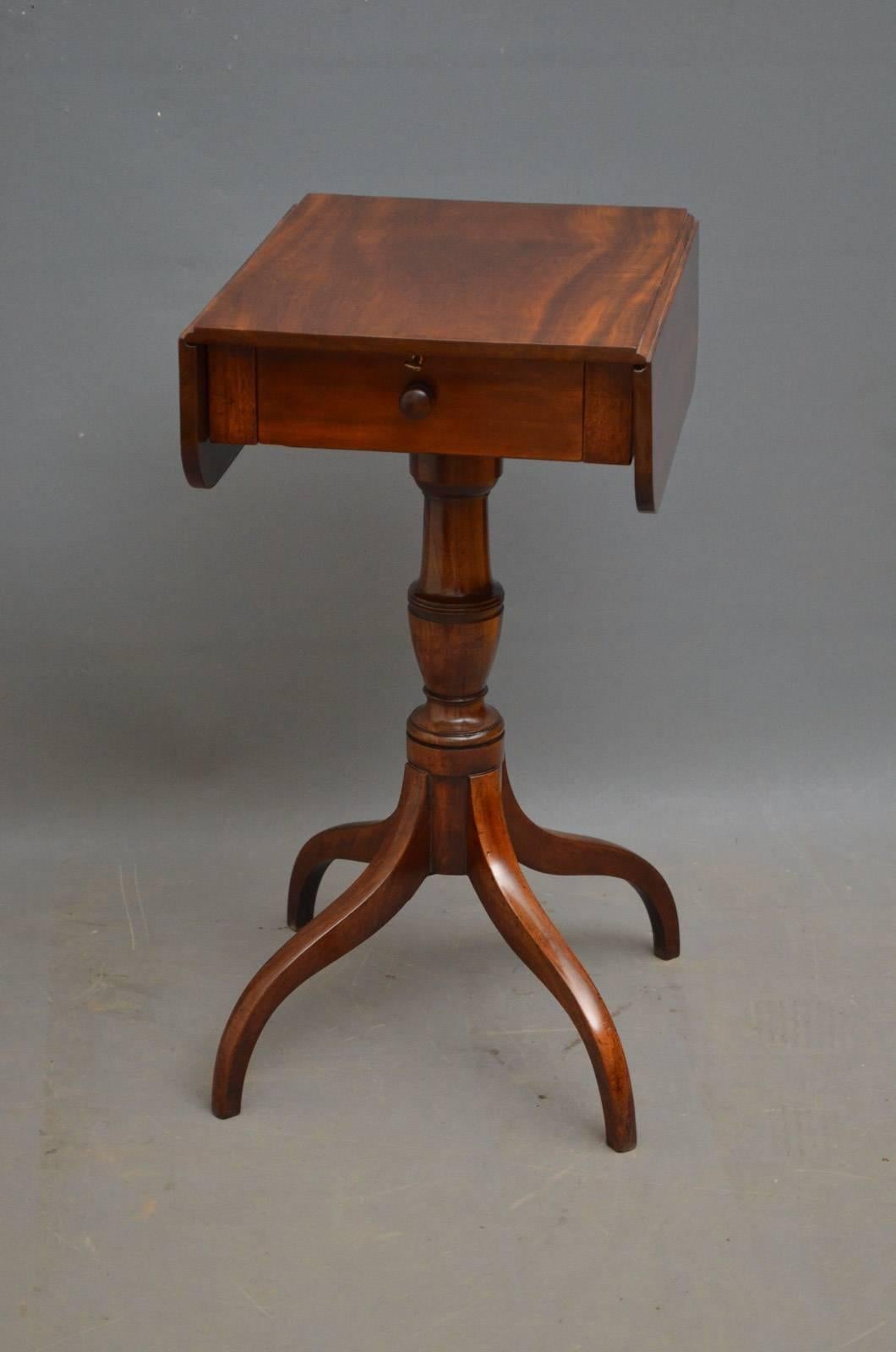 J00 an elegant Regency occasional table, having figured top with two drop leaves above a frieze drawer and turned column termination in three down swept legs. This antique table is in home ready condition, circa 1820
Measure: H 27.5? x W 13.5? x W