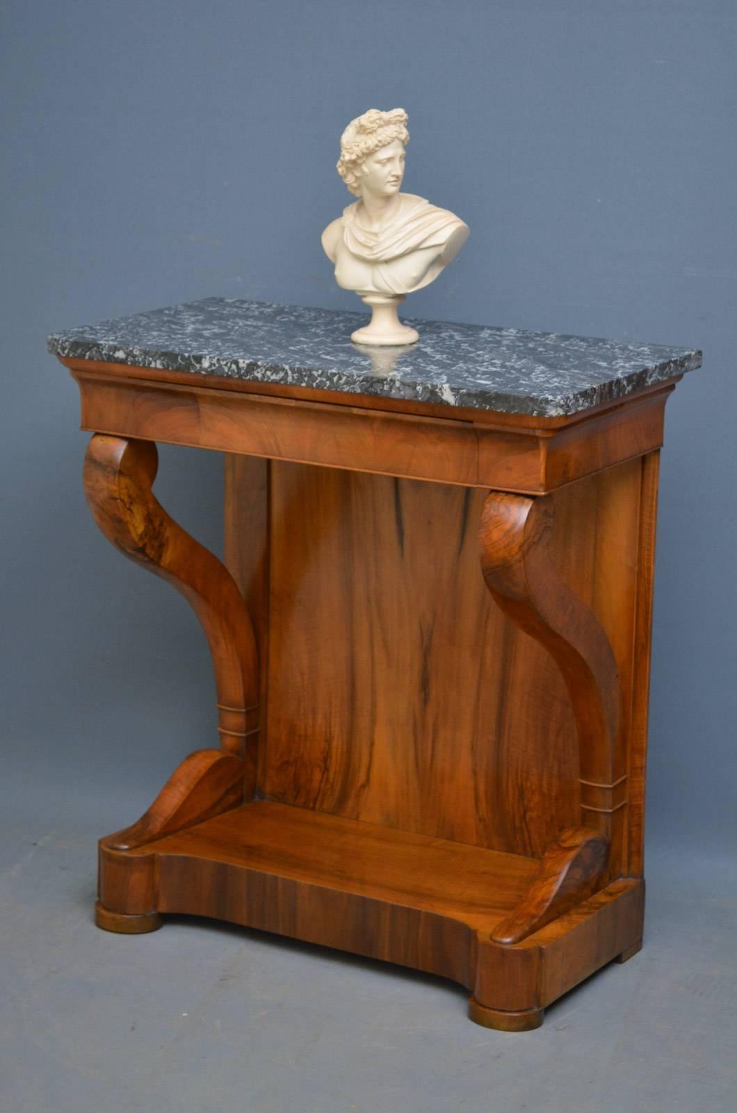 Sn4191 a 19th century walnut hall table, having grey and white veined top above a shaped frieze drawer and shaped supports terminating in platform base and bun feet. This antique hall table has been symptomatically restored and is ready to place at