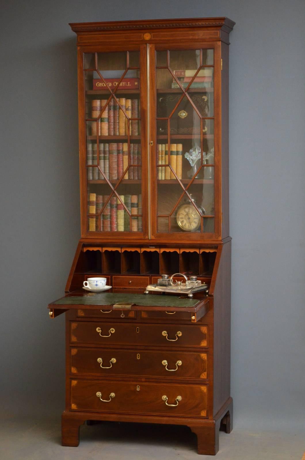 Sn4174 Slim and elegant Georgian mahogany and inlaid bureau bookcase, having dentil cornice and string inlaid frieze above a pair of astragal glazed doors enclosing three height adjustable shelves. The base having neoclassical inlaid fall, which